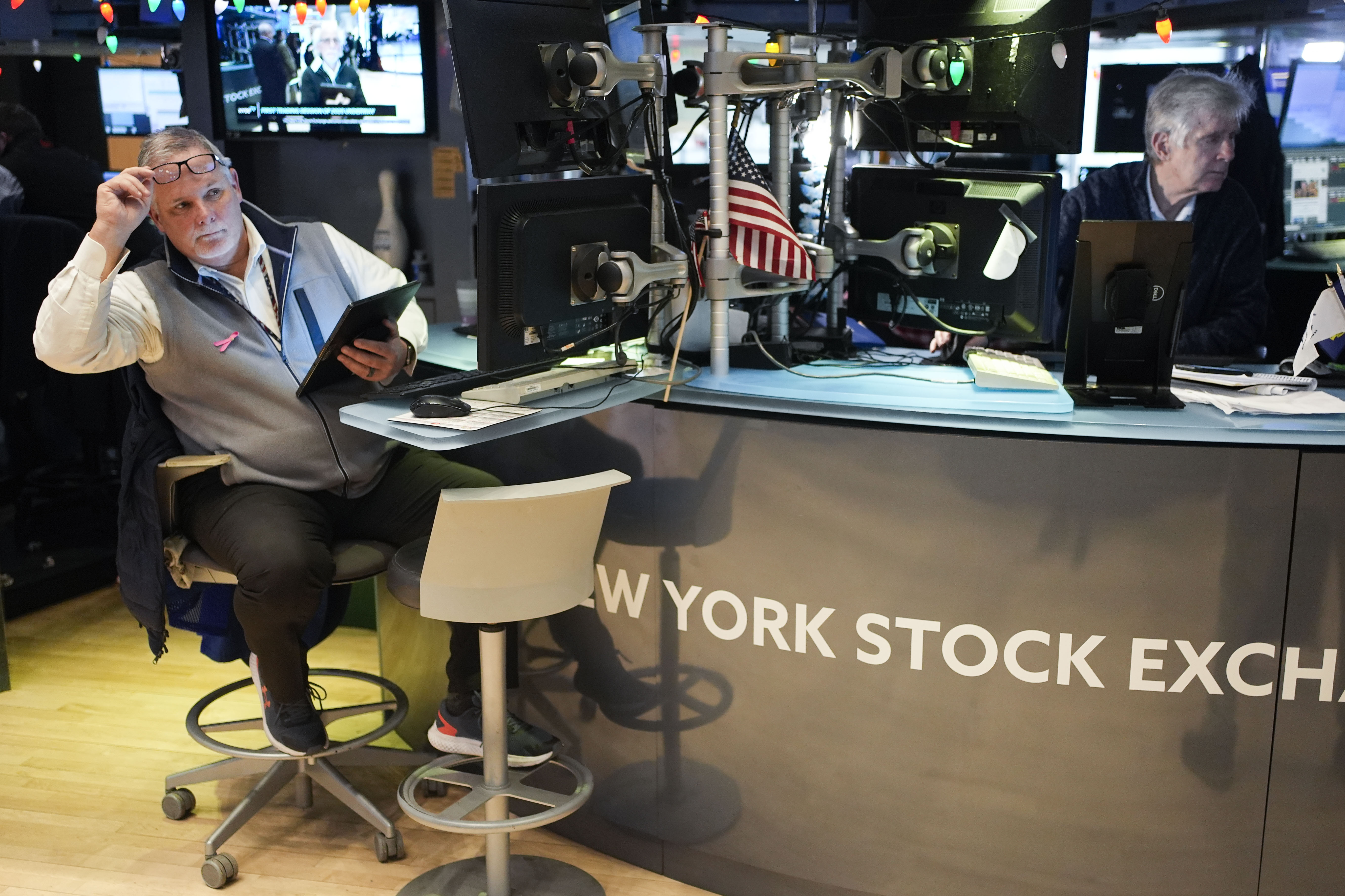 Traders work on the floor at the New York Stock Exchange in New York's Financial District Thursday, Jan. 2, 2025. (AP Photo/Seth Wenig)