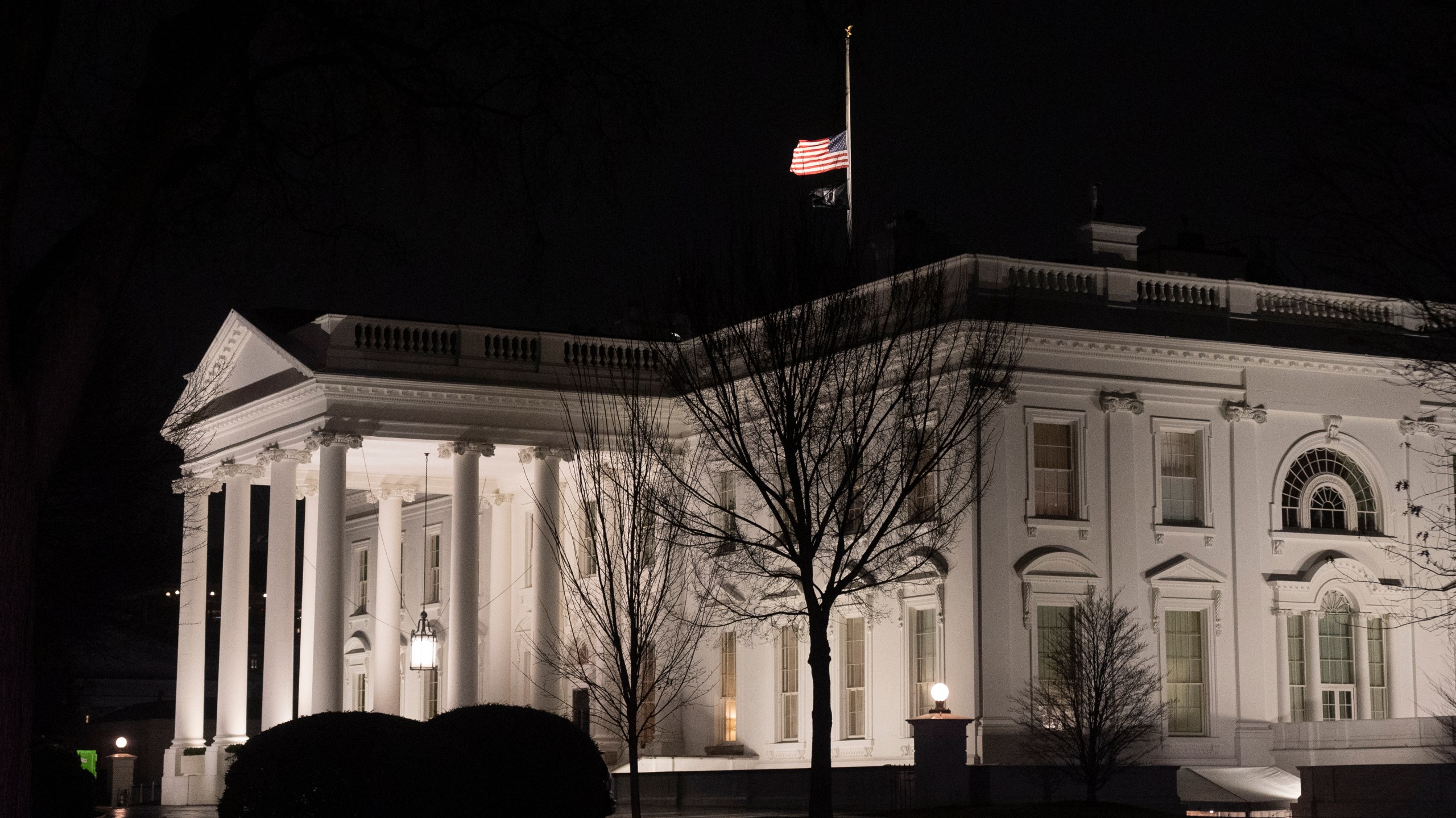 The flag flies at half-staff for the late President Jimmy Carter at the White House, Sunday, Dec. 29, 2024. Carter, who was 100 years old, died Sunday at his home in Plains, Ga. (AP Photo/Manuel Balce Ceneta)