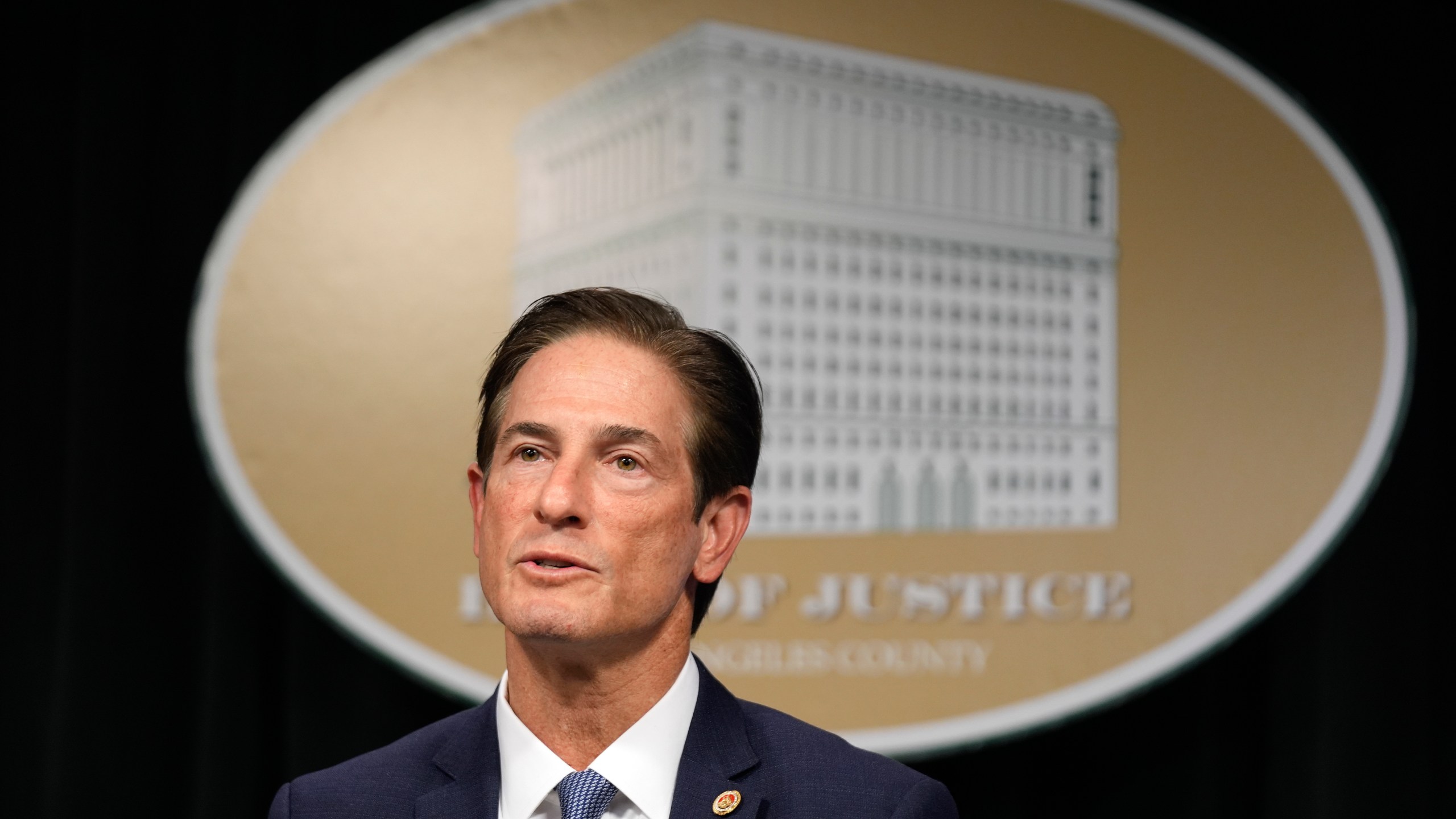 Los Angeles County District Attorney Nathan Hochman talks about the resentencing of Erik and Lyle Menendez for the murders of their parents decades ago during a news conference in downtown Los Angeles on Friday, Jan. 3, 2025. (AP Photo/Damian Dovarganes)