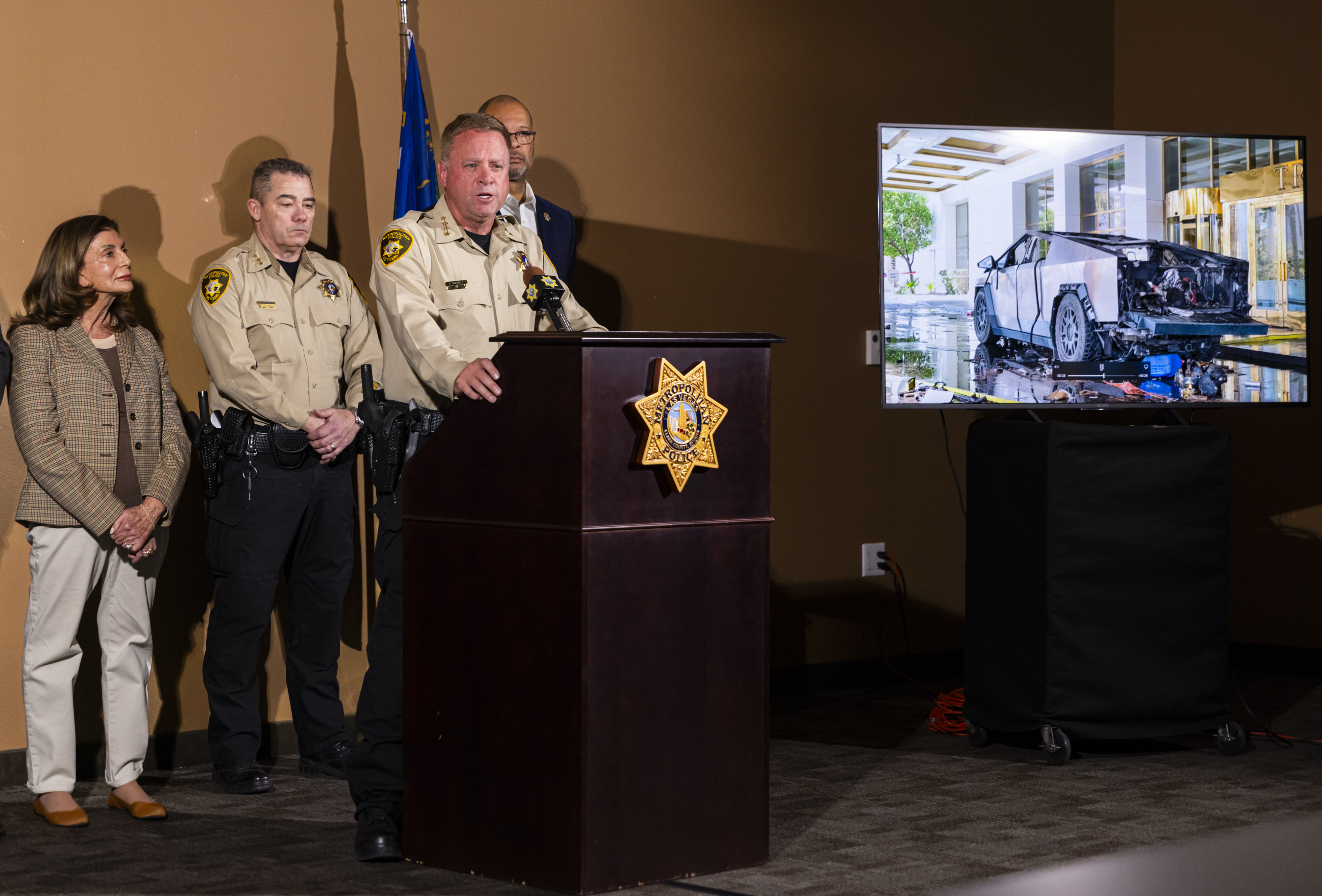 Clark County Sheriff Kevin McMahill briefs the media about the Tesla Cybertruck which exploded in front of the entrance to Trump International Hotel in Las Vegas Wednesday, Jan. 1, 2025, in Las Vegas. (Chase Stevens/Las Vegas Review-Journal via AP)