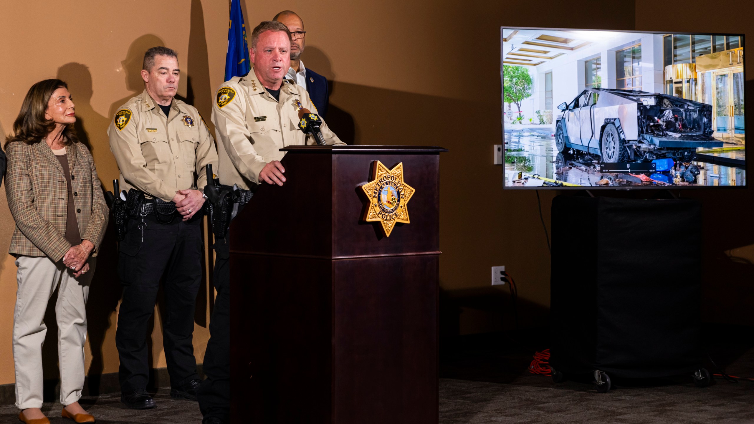 Clark County Sheriff Kevin McMahill briefs the media about the Tesla Cybertruck which exploded in front of the entrance to Trump International Hotel in Las Vegas Wednesday, Jan. 1, 2025, in Las Vegas. (Chase Stevens/Las Vegas Review-Journal via AP)