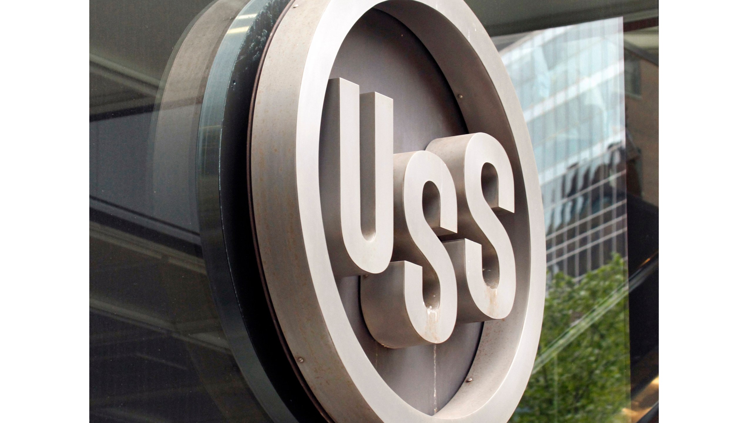 FILE - The United States Steel logo is pictured outside the headquarters building in downtown Pittsburgh, April 26, 2010. (AP Photo/Gene J. Puskar, File)