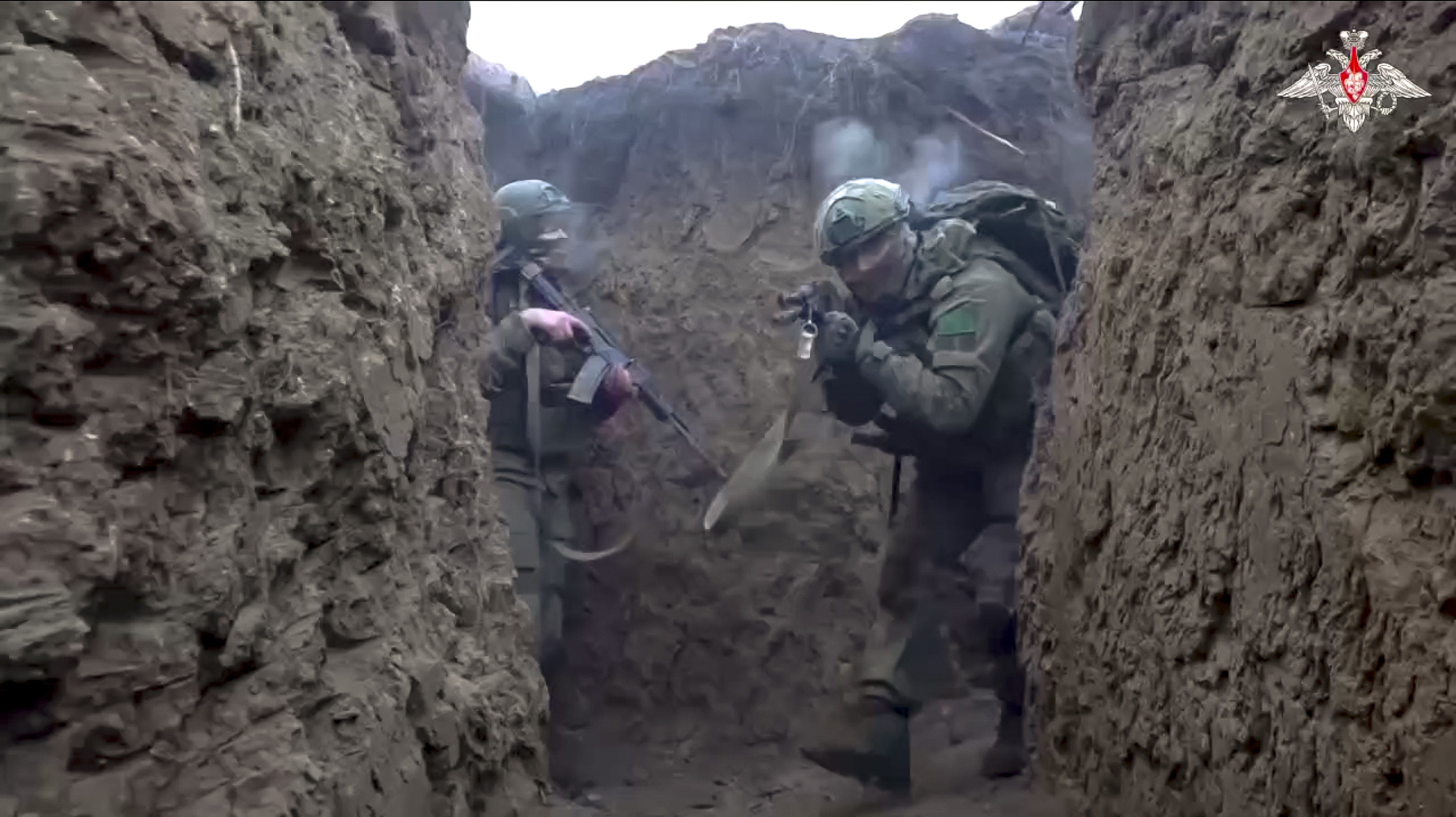 In this photo taken from video distributed by Russian Defense Ministry Press Service on Saturday, Jan. 4, 2025, Russian servicemen attend a combat training for assault units in an undisclosed location. (Russian Defense Ministry Press Service via AP)