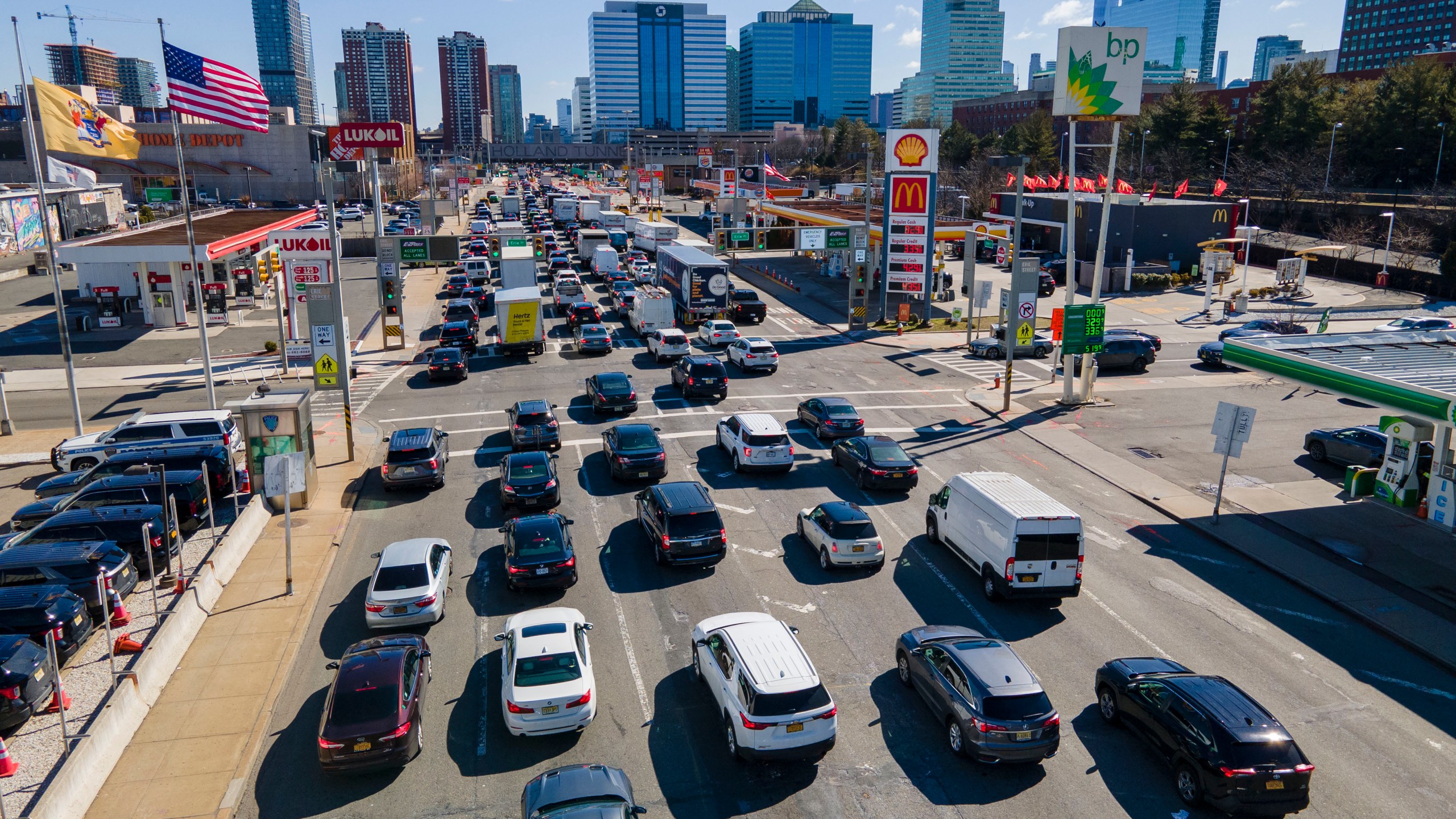 FILE - Commuters wait to drive through the Holland Tunnel into New York City during morning rush hour traffic, in Jersey City, N.J., March 8, 2023. (AP Photo/Ted Shaffrey, File)