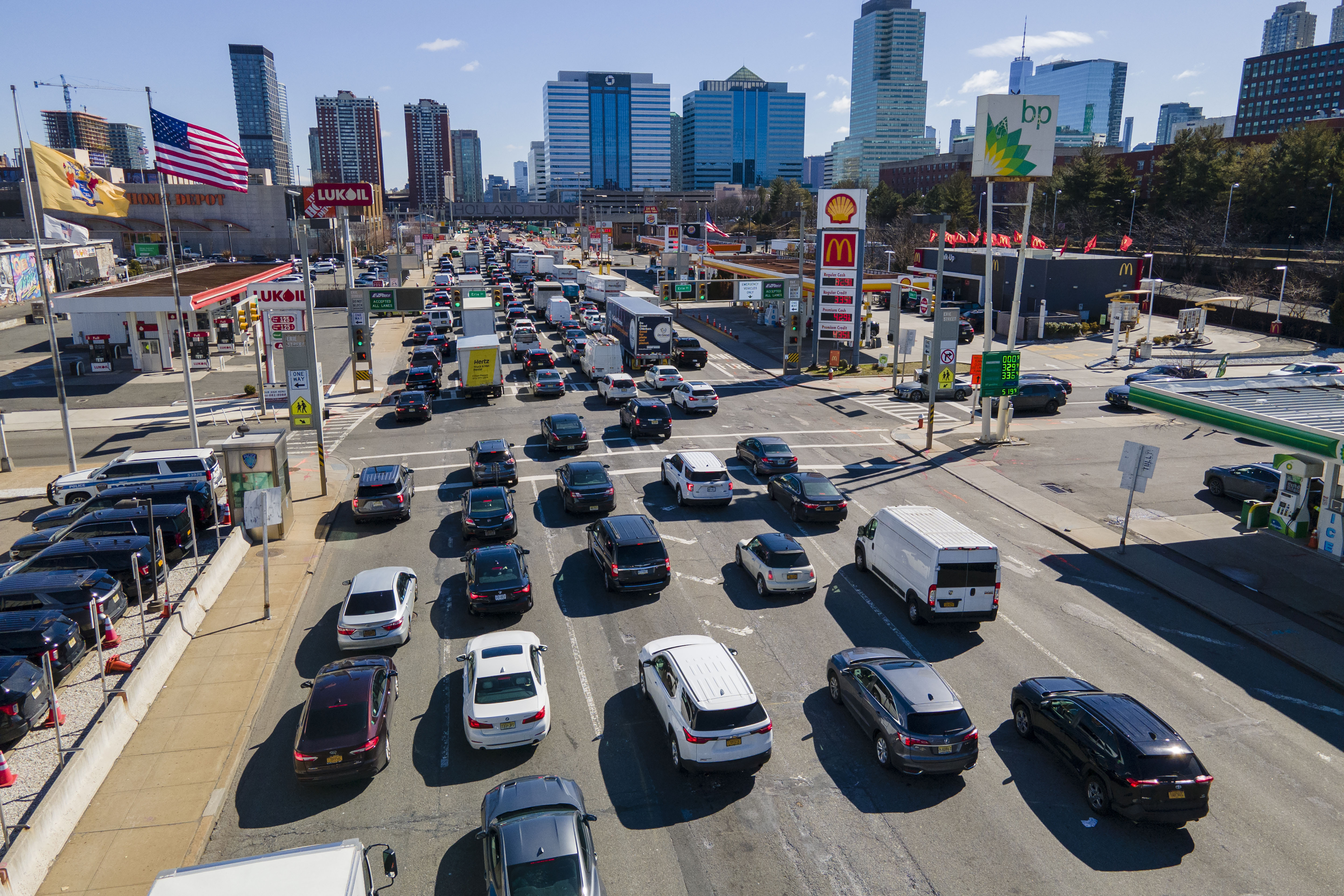 FILE - Commuters wait to drive through the Holland Tunnel into New York City during morning rush hour traffic, in Jersey City, N.J., March 8, 2023. (AP Photo/Ted Shaffrey, File)