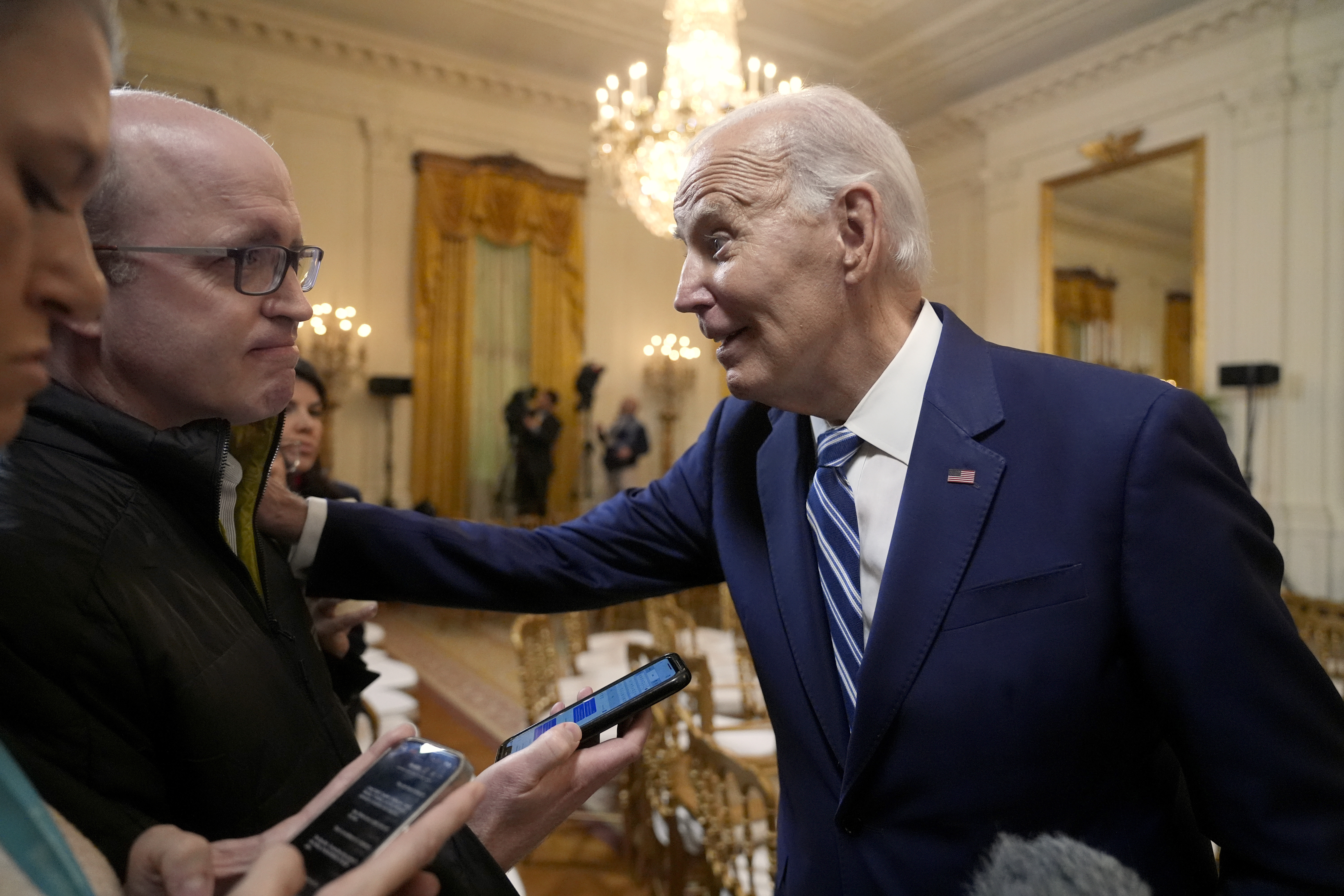 President Joe Biden speaks with reporters after signing the Social Security Fairness Act in the East Room of the White House, Sunday, Jan. 5, 2025, in Washington. (AP Photo/Manuel Balce Ceneta)