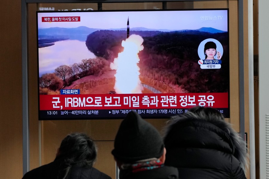 A TV screen shows a file image of North Korea's missile launch during a news program at Seoul Railway Station in Seoul, South Korea, Monday, Jan. 6, 2025. (AP Photo/Ahn Young-joon)