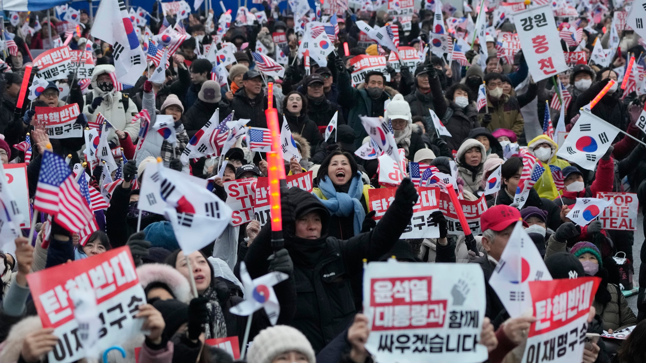 Supporters of impeached South Korean President Yoon Suk Yeol attend a rally to oppose his impeachment near the presidential residence in Seoul, South Korea, Monday, Jan. 6, 2025. (AP Photo/Ahn Young-joon)