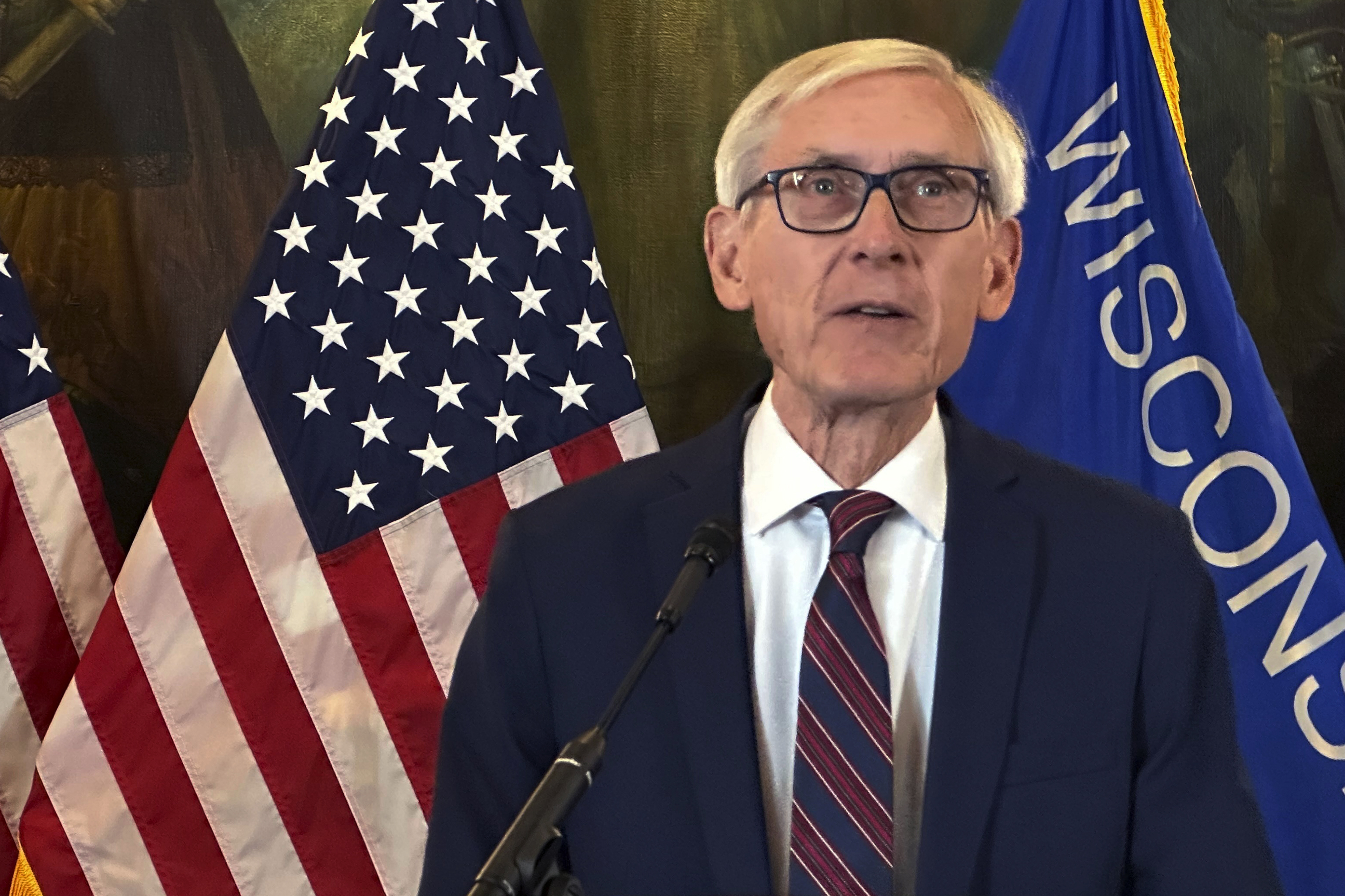 Wisconsin Gov. Tony Evers announces a plan that would allow people to repeal and enact state law without legislative involvement during a news conference in the state Capitol building in Madison on Friday, Jan. 3, 2025 (AP Photo/Todd Richmond)