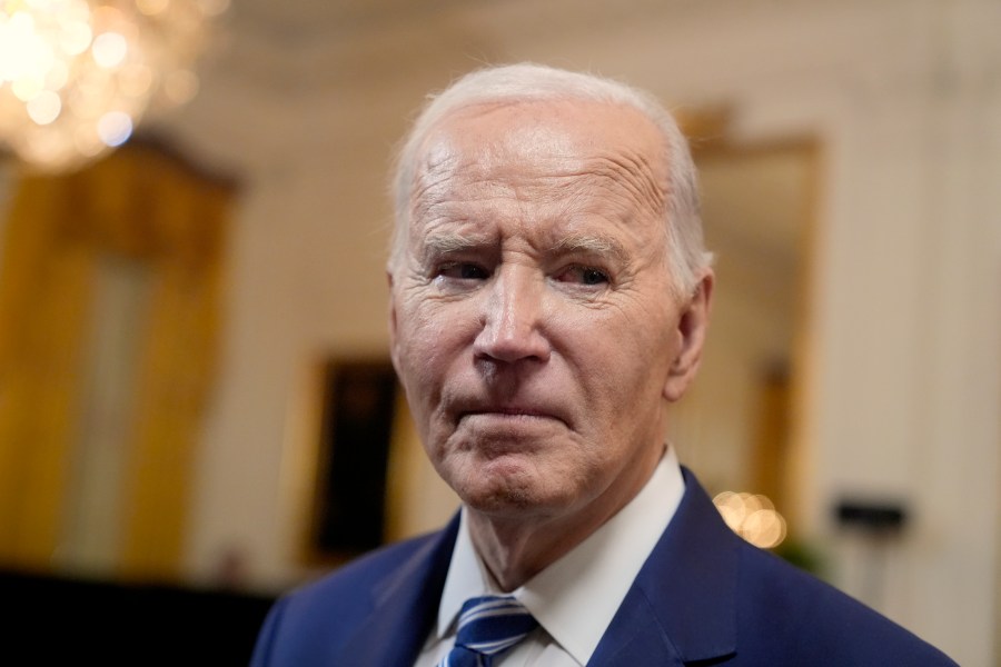 President Joe Biden speaks with reporters after signing the Social Security Fairness Act in the East Room of the White House, Sunday, Jan. 5, 2025, in Washington. (AP Photo/Manuel Balce Ceneta)