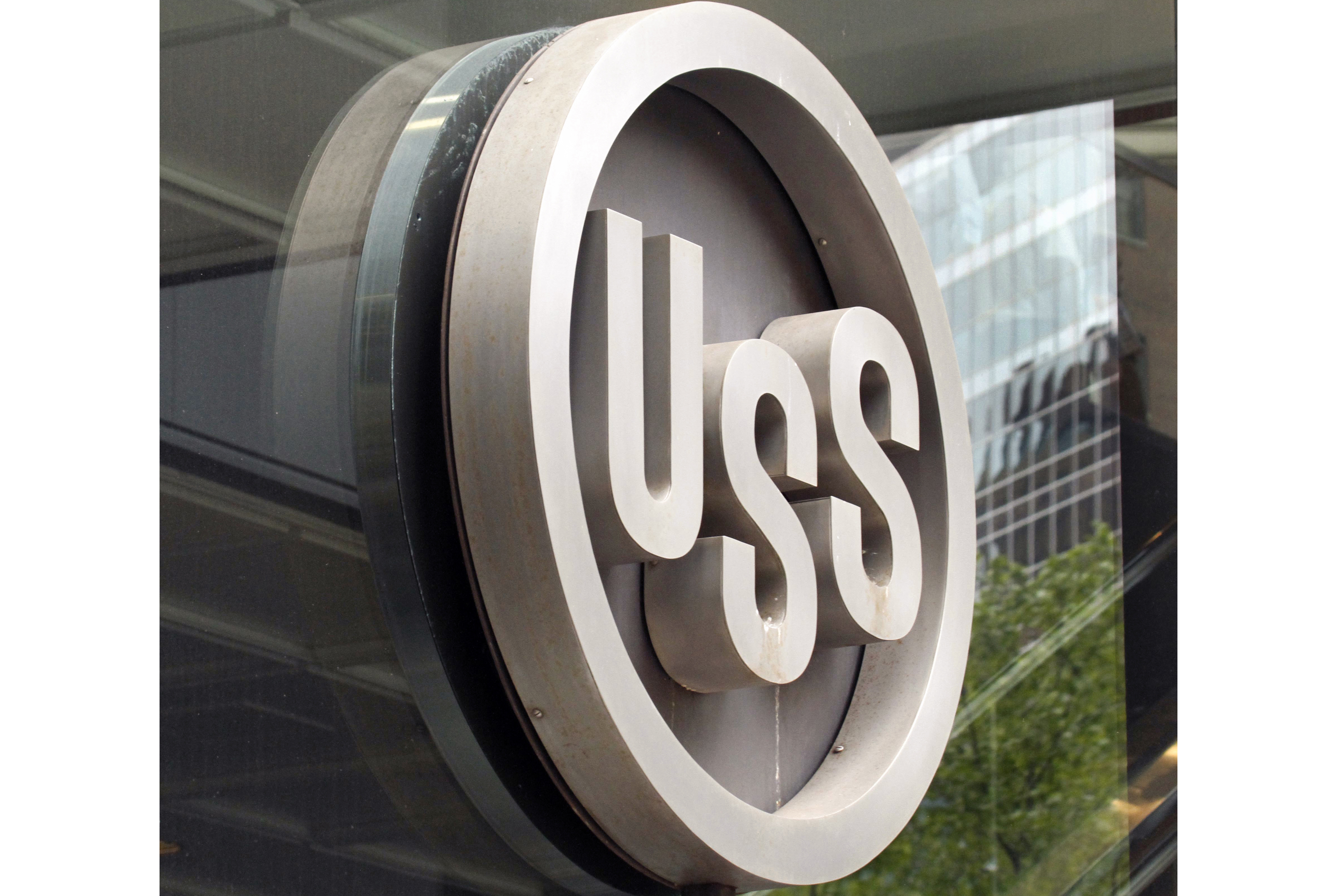 FILE - This April 26, 2010, file photo shows the United States Steel logo outside the headquarters building in downtown Pittsburgh. (AP Photo/Gene J. Puskar, File)