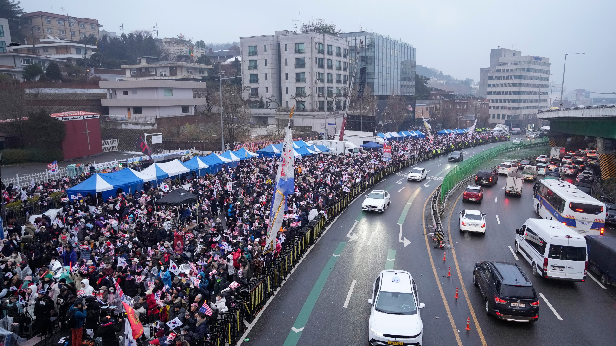 Supporters of impeached South Korean President Yoon Suk Yeol stage a rally to oppose his impeachment near the presidential residence in Seoul, South Korea, Monday, Jan. 6, 2025. (AP Photo/Ahn Young-joon)