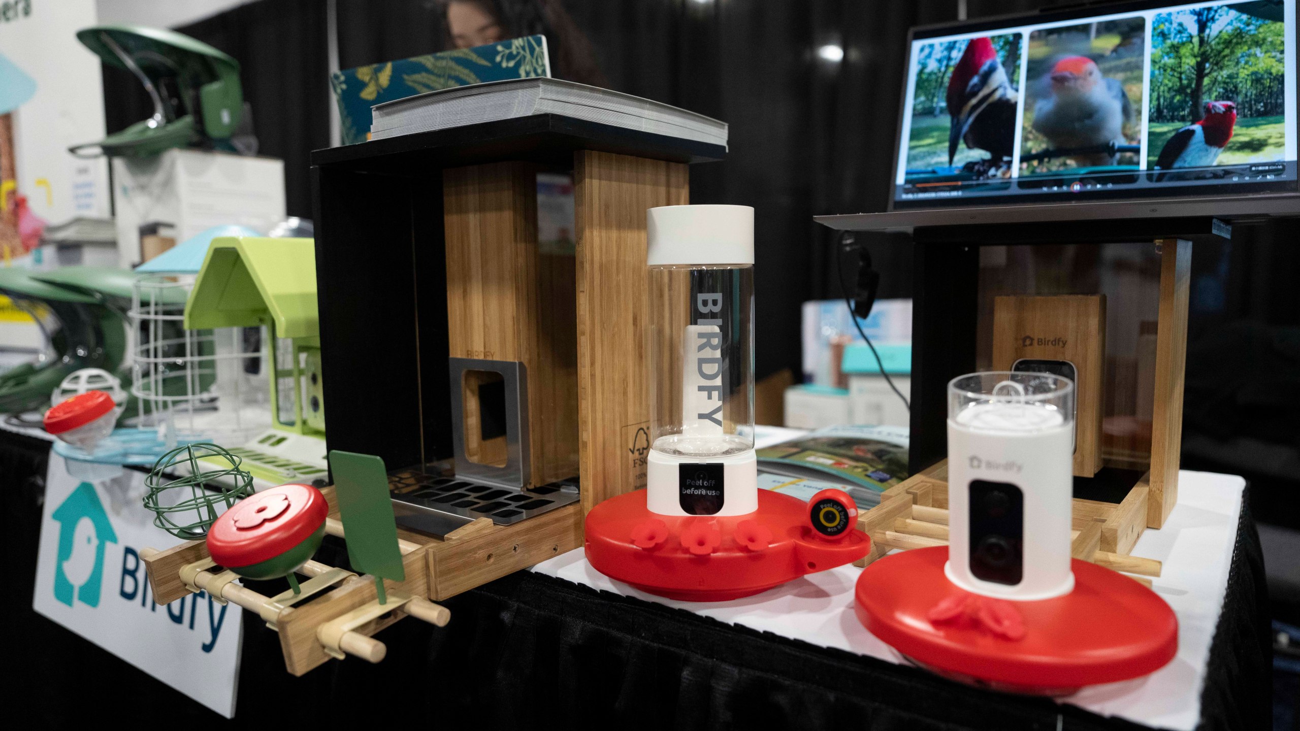 Birdfy showcases their bird feeders with built-in cameras during 2025 CES Unveiled, Sunday, Jan. 5, 2025, in Las Vegas. (Photo by Jack Dempsey)