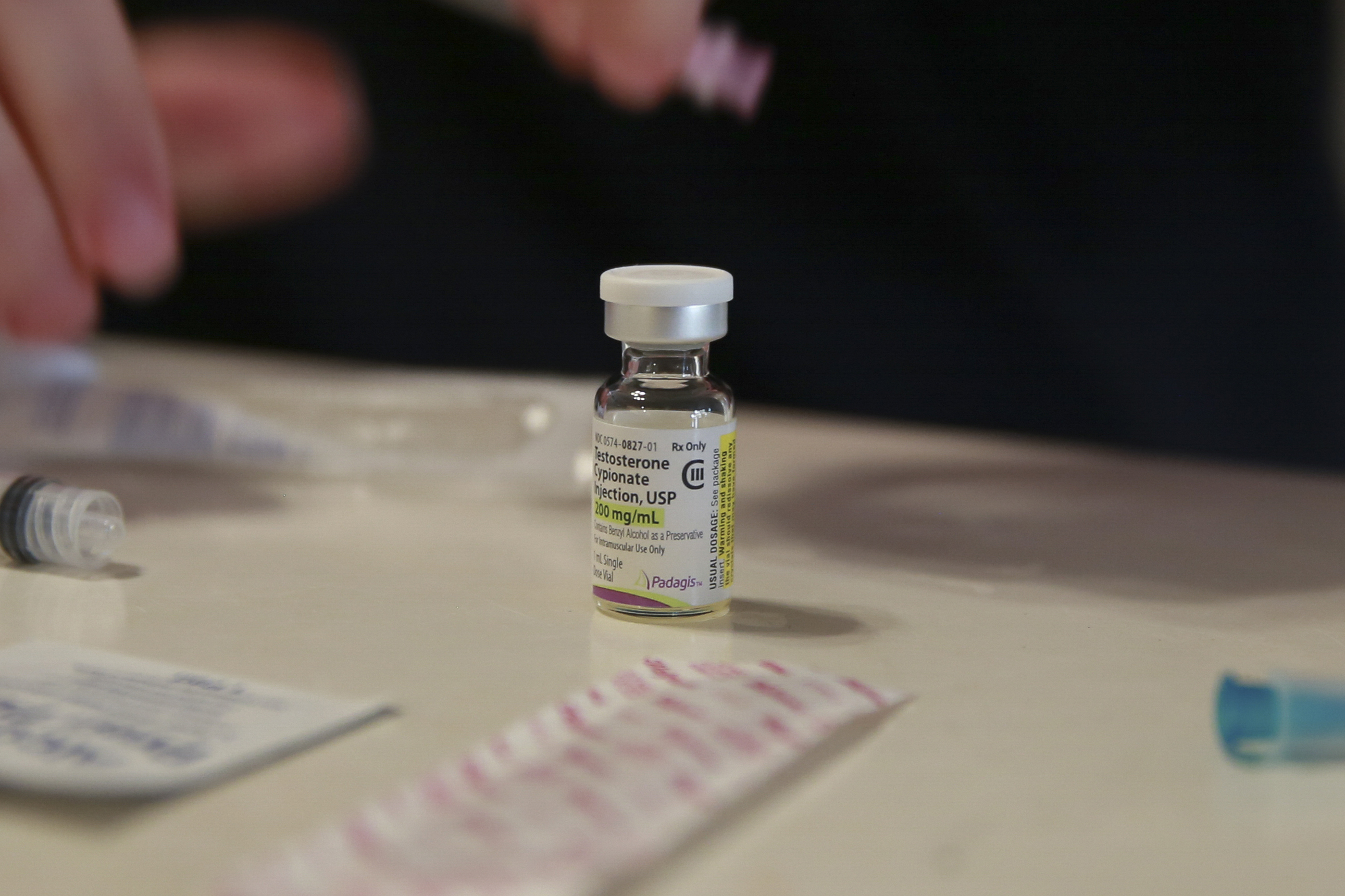 FILE - A vial of testosterone is prepared for injection at a home in Florida, on May 29, 2023. (AP Photo/Laura Bargfeld)