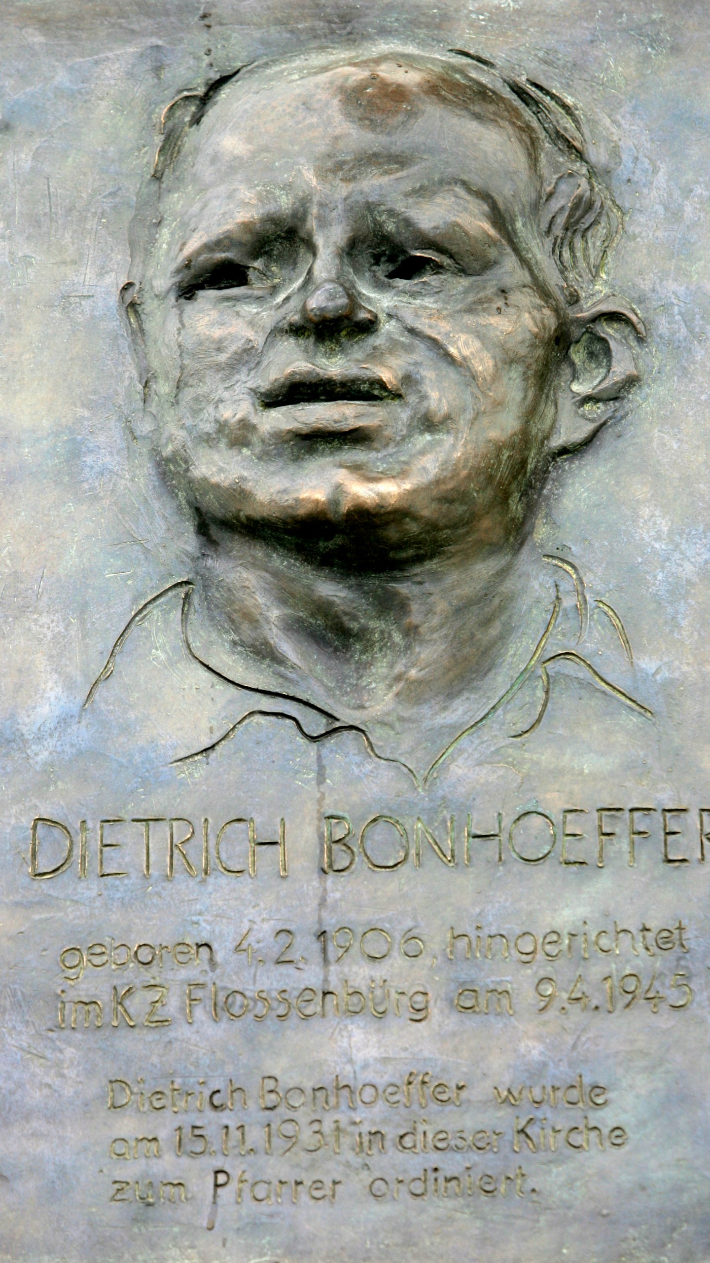 FILE - A metal plaque with a portrait of German priest Dietrich Bonhoeffer is on display at the St. Matthaeus Church in Berlin, Feb. 4, 2006. The plaque by artist Johannes Gruetzke reminds the ordination of Bonhoeffer at the church on Nov. 15, 1931. (AP Photo/Markus Schreiber, File)