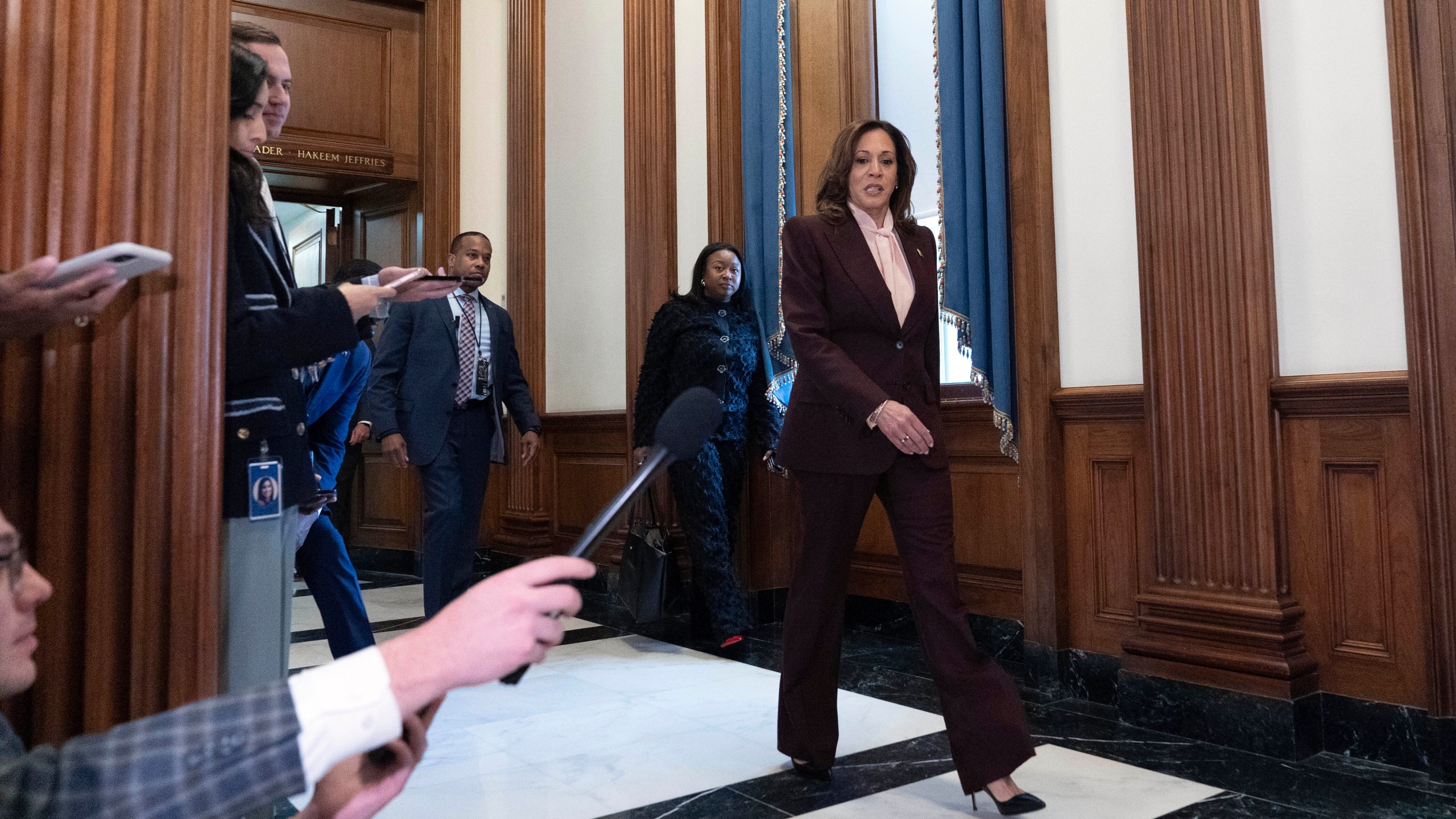 Vice President Kamala Harris walks to speak with reporters after presiding over a joint session of congress to confirm the Electoral College votes at the Capitol, Monday, Jan. 6, 2025, in Washington. (AP Photo/Jose Luis Magana)