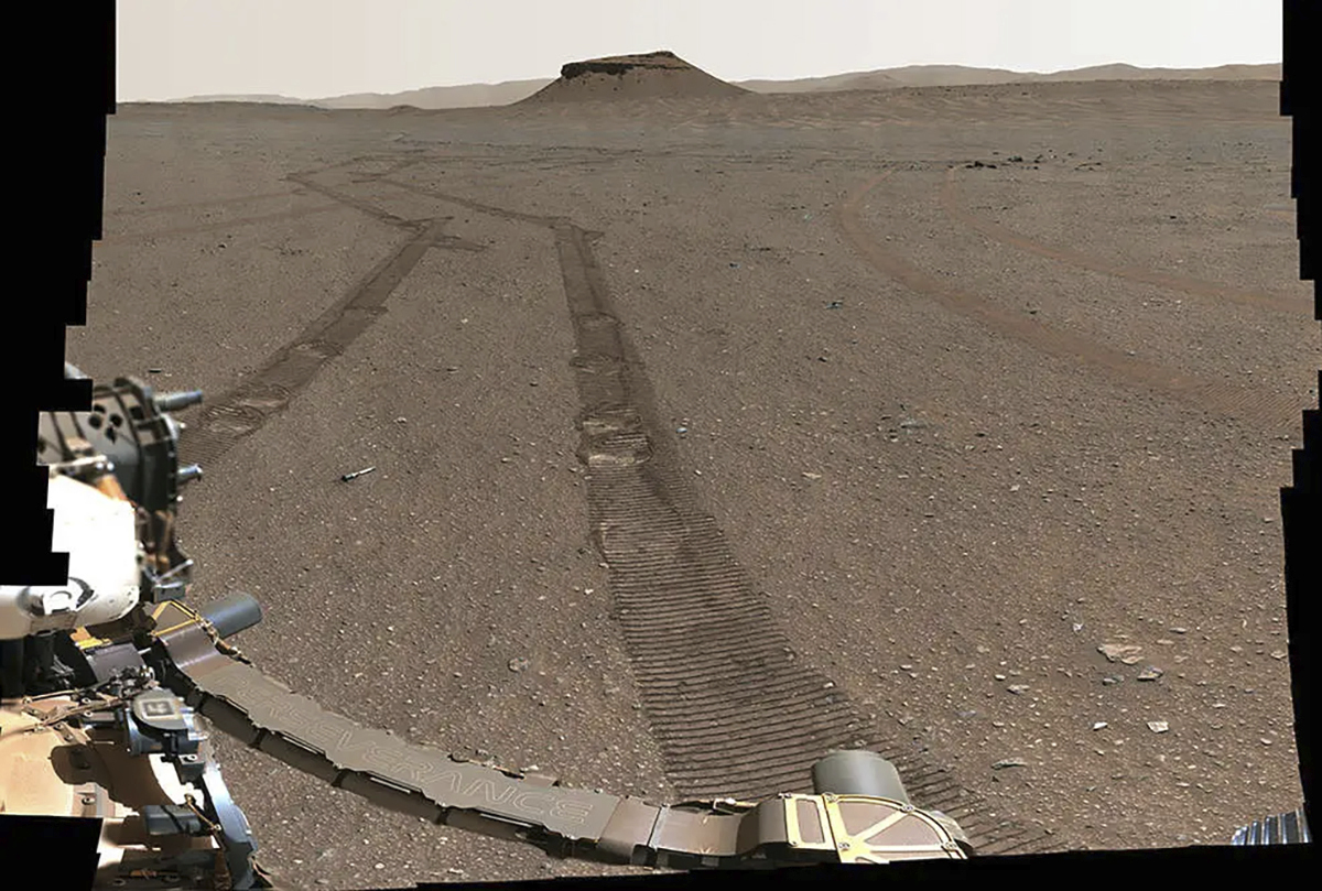 This image provided by NASA shows Perseverance rover capturing a portrait of its recently completed sample depot using its Mastcam-Z camera on Jan. 31, 2023. (NASA/JPL-Caltech/ASU/MSSS via AP)