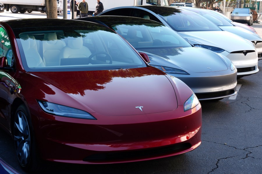 FILE - Tesla vehicles are displayed at the AutoMobility LA Auto Show, in Los Angeles, Nov. 21, 2024. (AP Photo/Damian Dovarganes, File)