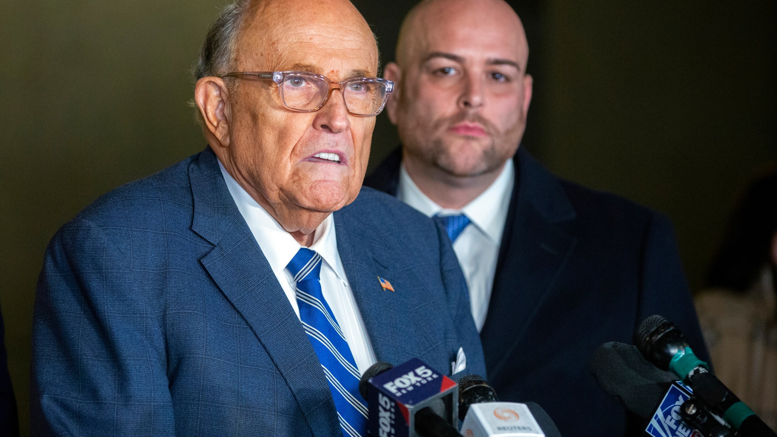 Rudy Giuliani speaks to the media outside Manhattan federal court in New York after testifying in a contempt hearing, Friday, Jan. 3, 2025. (AP Photo/Ted Shaffrey)