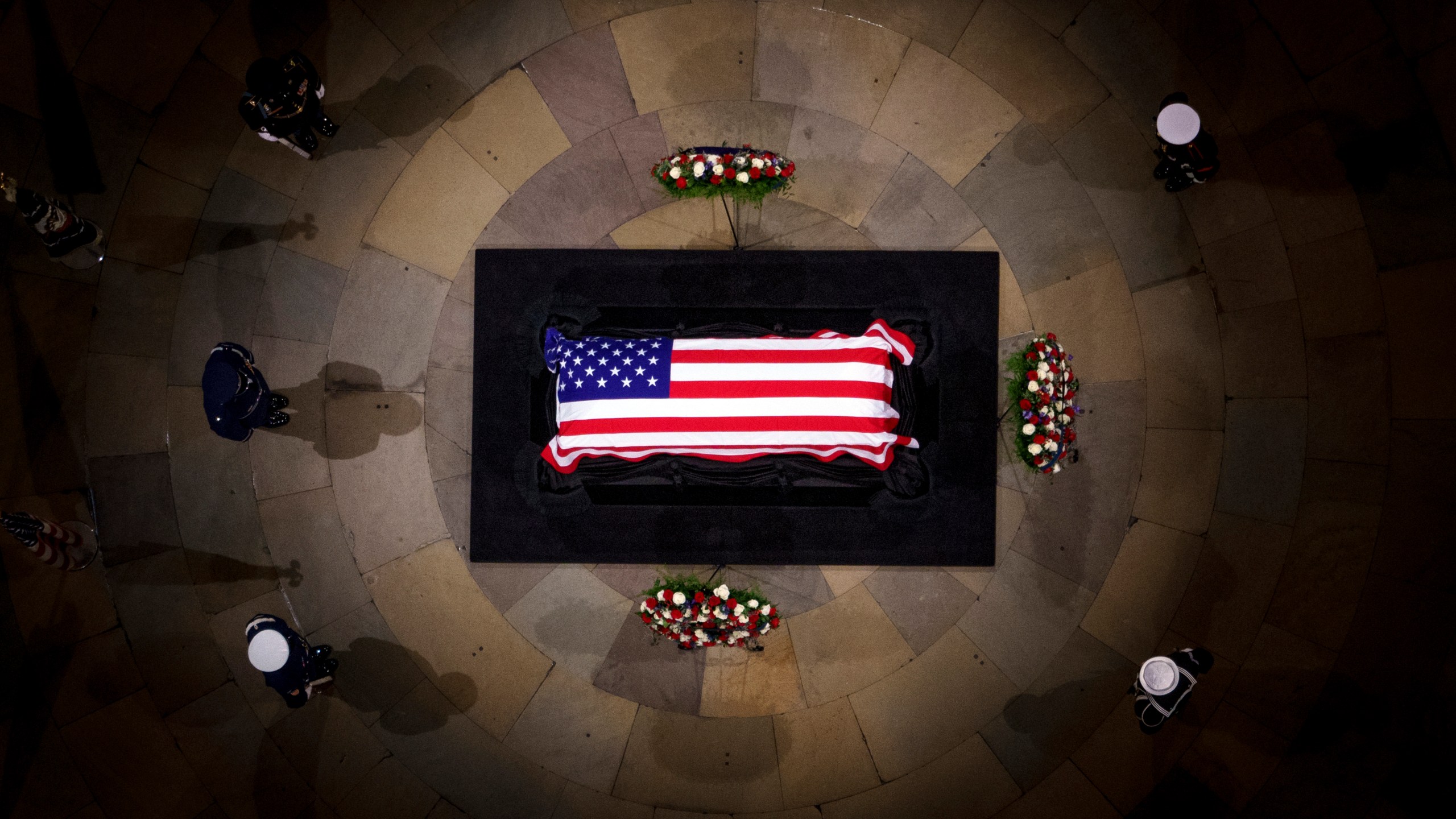 The flag-draped casket of former President Jimmy Carter lies in state at the rotunda of the U.S. Capitol Tuesday, Jan. 7, 2025, in Washington. (Andrew Harnik/Pool via AP)