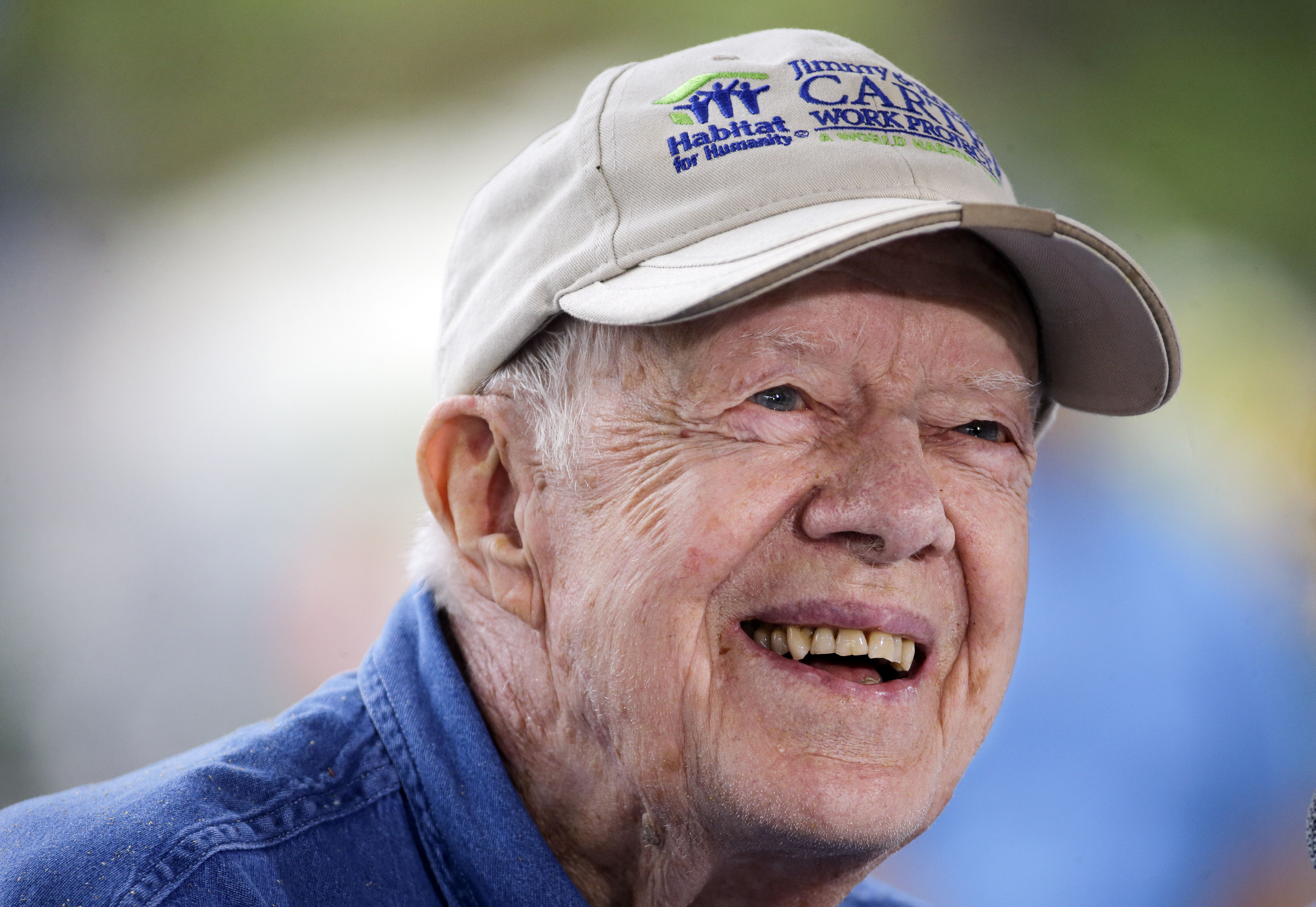 FILE - Former President Jimmy Carter answers questions during a news conference at a Habitat for Humanity building site, in Memphis, Tenn., on Nov. 2, 2015. (AP Photo/Mark Humphrey, File)