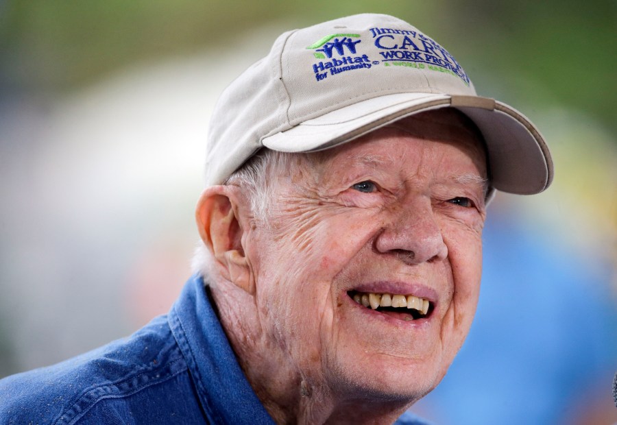 FILE - Former President Jimmy Carter answers questions during a news conference at a Habitat for Humanity building site, in Memphis, Tenn., on Nov. 2, 2015. (AP Photo/Mark Humphrey, File)