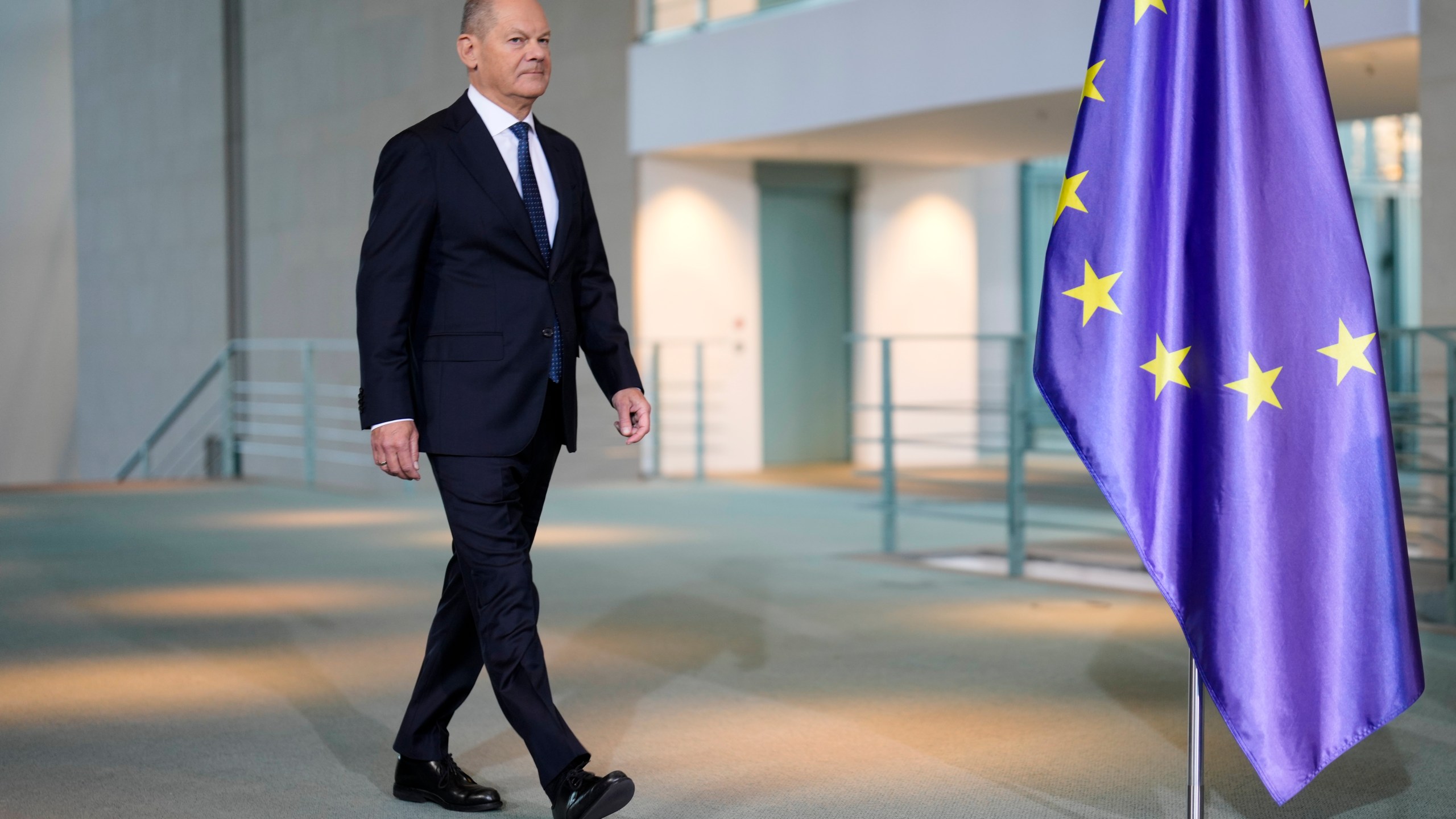 German Chancellor Olaf Scholz arrives for a statement at the chancellery in Berlin, Germany, Wednesday, Jan. 8, 2025. (AP Photo/Markus Schreiber)