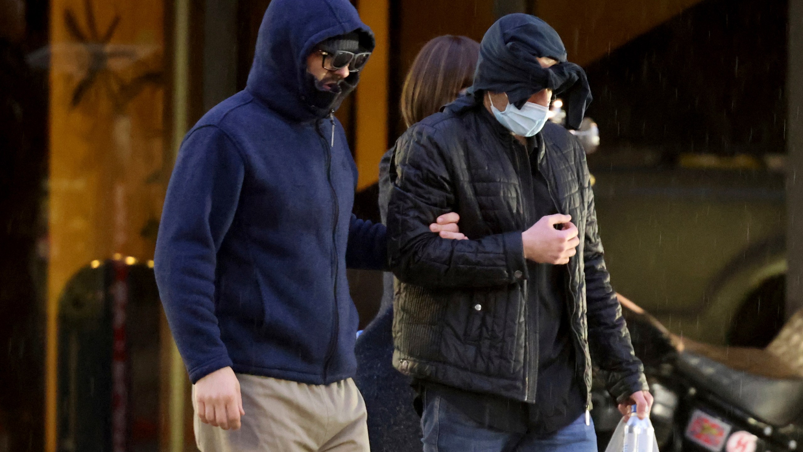 FILE - Former FBI informant Alexander Smirnov, left, walks out of his lawyer's office in downtown Las Vegas after being released from federal custody Feb. 20, 2024. (K.M. Cannon/Las Vegas Review-Journal via AP, File)