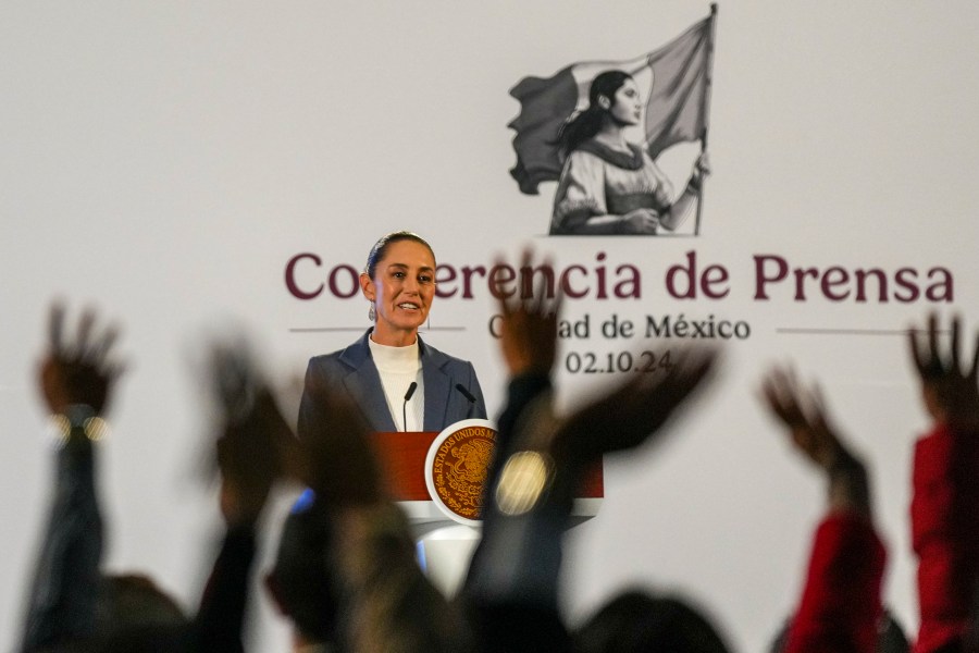 FILE - Mexican President Claudia Sheinbaum gives a media briefing at the National Palace in Mexico City, Oct. 2, 2024. (AP Photo/Fernando Llano, File)