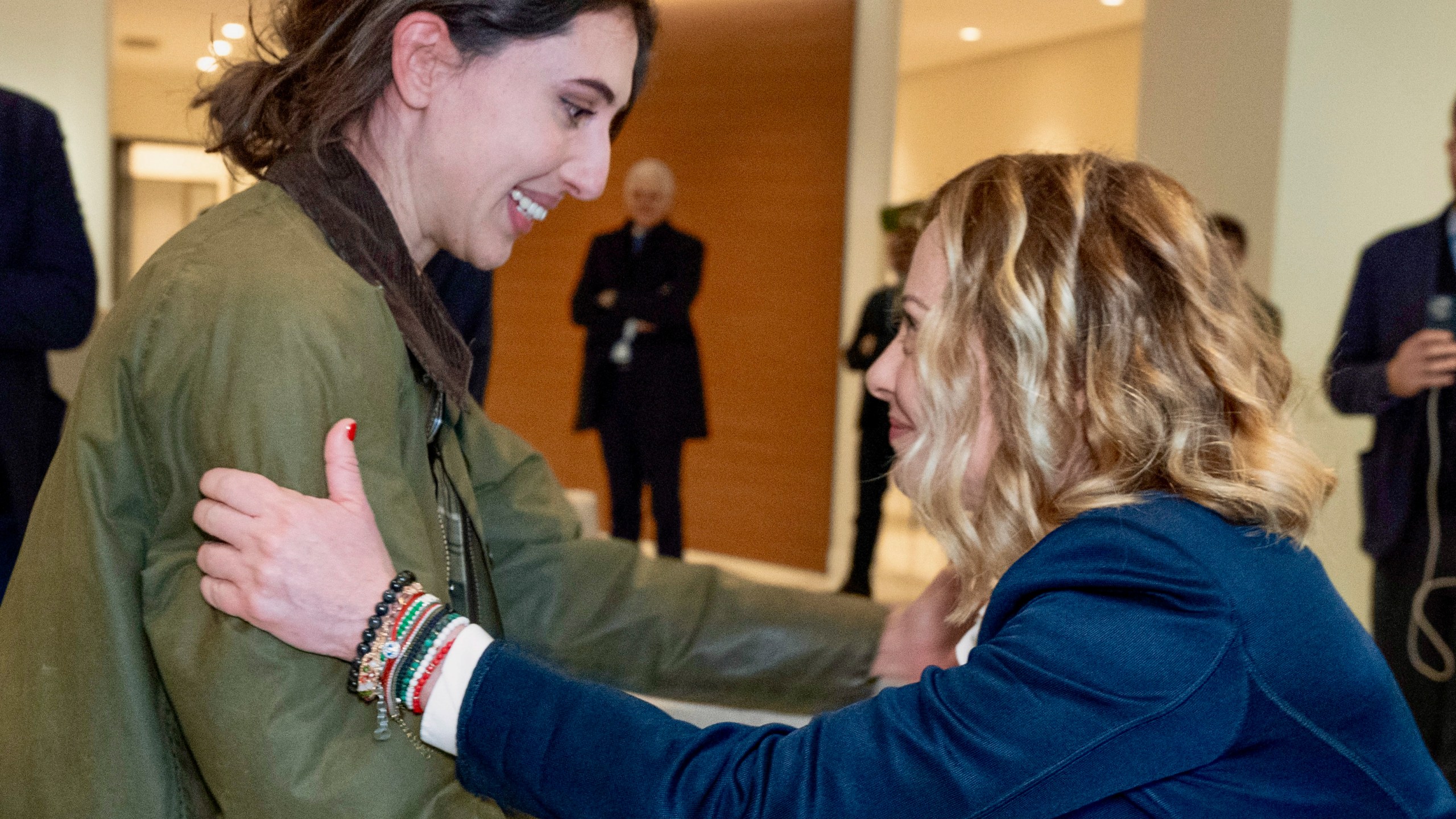 Cecilia Sala, left, an Italian journalist who was detained on Dec. 19 as she was reporting in Iran, is welcomed by Italian Premier Giorgia Meloni as she landed at Rome' Ciampino airport after being released, Wednesday, Jan. 8, 2025. (Filippo Attili, Italian Government Office via Ap )