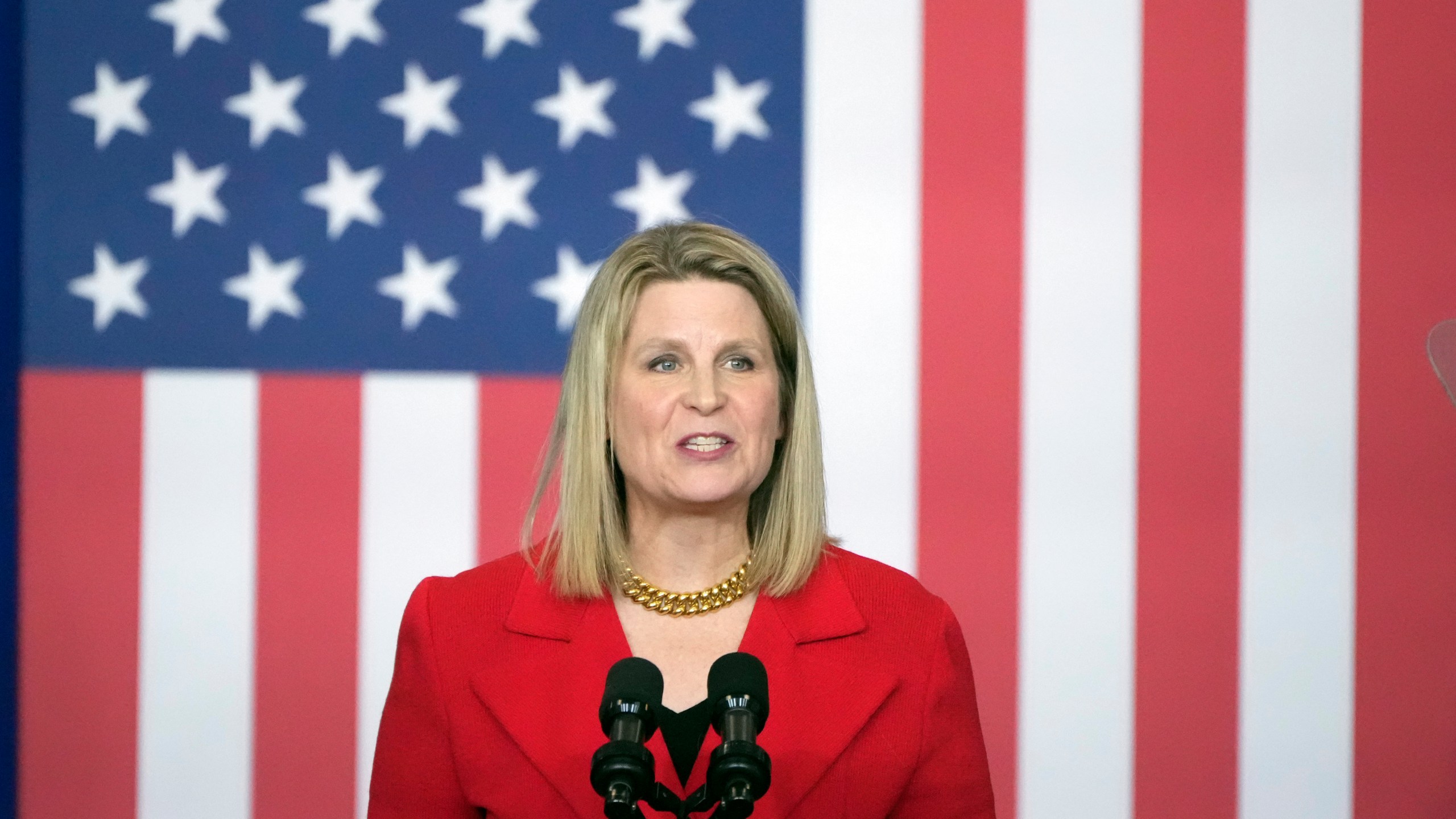 Elizabeth Shuler, president of the AFL-CIO, speaks before President Joe Biden arrives to speak at the Department of Labor in Washington, Monday, Dec. 16, 2024. (AP Photo/Mark Schiefelbein)