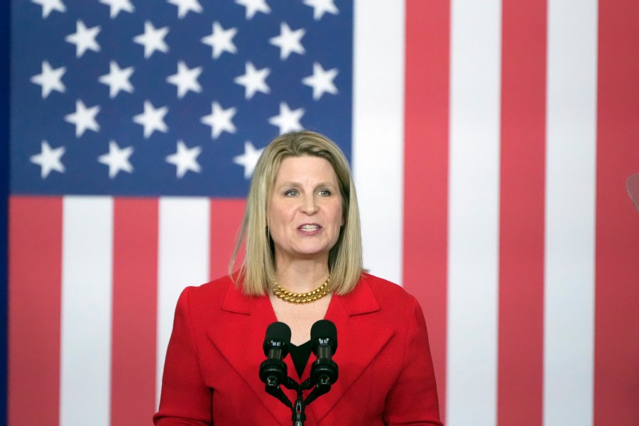 Elizabeth Shuler, president of the AFL-CIO, speaks before President Joe Biden arrives to speak at the Department of Labor in Washington, Monday, Dec. 16, 2024. (AP Photo/Mark Schiefelbein)