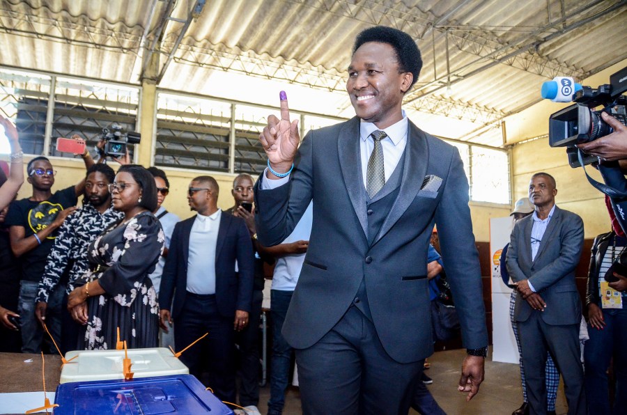 FILE - Independent candidate Venancio Mondlane holds up his finger after casting his vote in general elections in Maputo, Mozambique, Wednesday, Oct. 9, 2024. (AP Photo/Carlos Equeio, File)