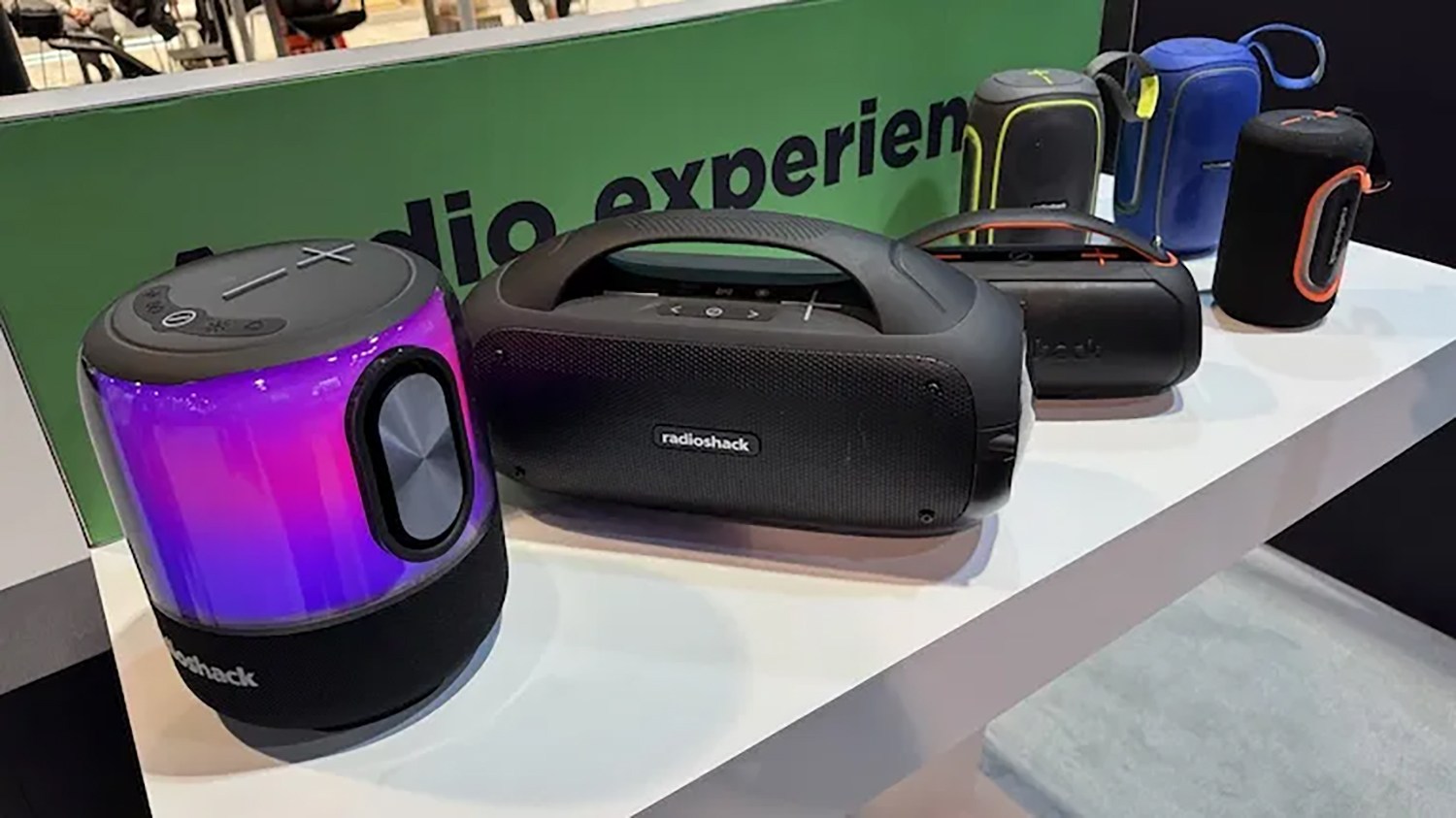 RadioShack's collection of Bluetooth speakers at CES. (Jacob Palmer/BestReviews) / Is RadioShack back? Brand attempts return to relevance with consumer products