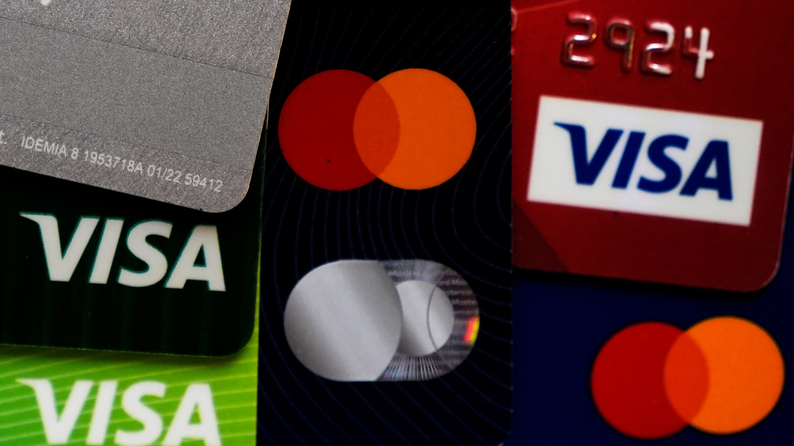 FILE - Several VISA and MASTER credit cards are shown in Buffalo Grove, Ill., Thursday, Feb. 8, 2024. (AP Photo/Nam Y. Huh, File)