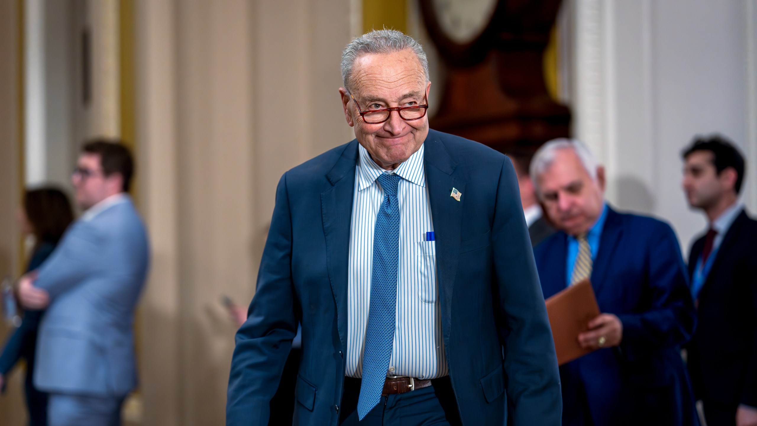 Senate Majority Leader Chuck Schumer, D-N.Y., arrives to update reporters on efforts to fund the government before the midnight Friday deadline, at the Capitol in Washington, Tuesday, Dec. 17, 2024. Congressional leaders are nearing the unveiling of an agreement that will keep the federal government funded through March 14 and provide more than $100 billion in emergency aid to help states and local communities recover from Hurricanes Helene and Milton, and other natural disasters. (AP Photo/J. Scott Applewhite)