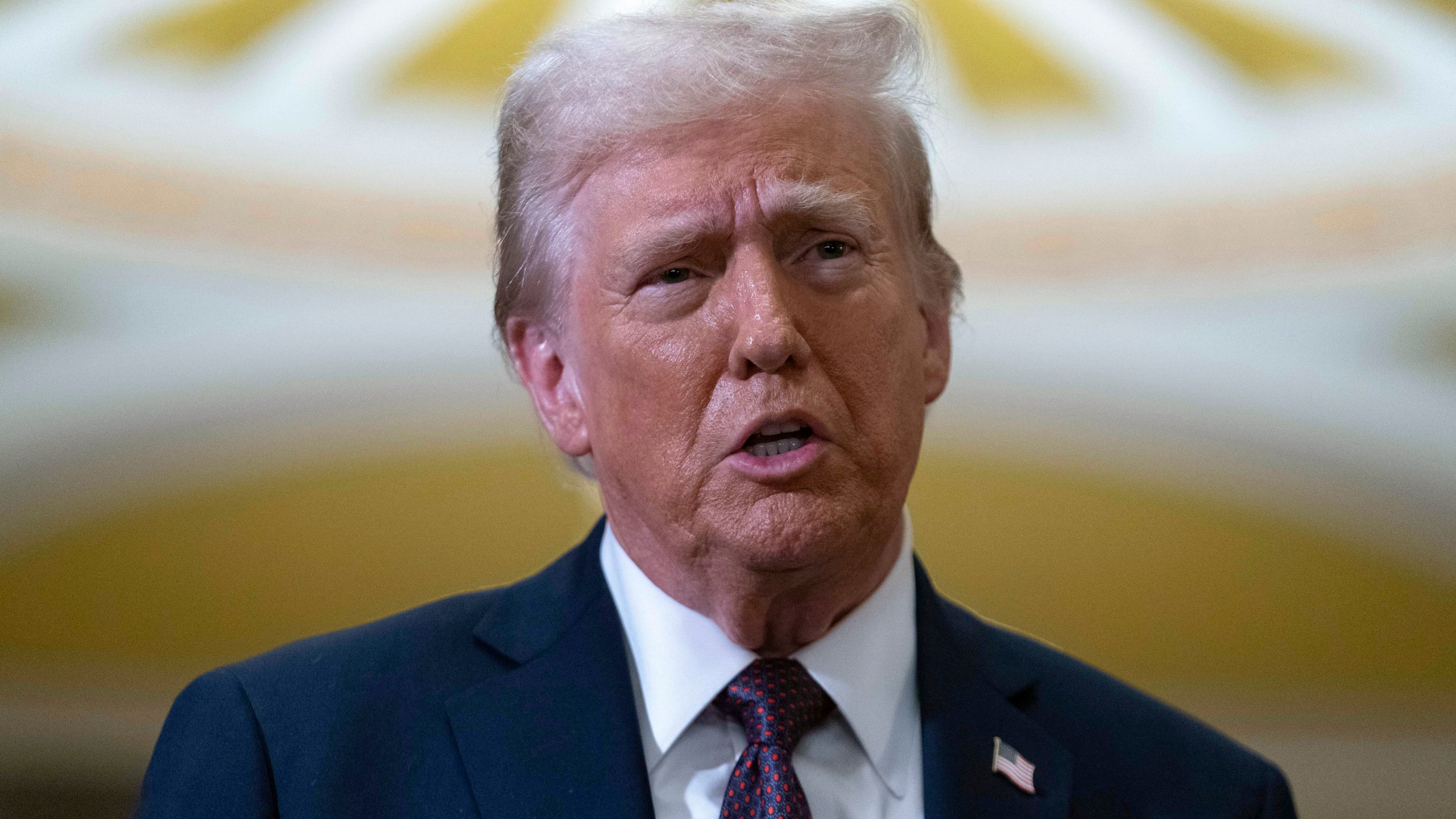 President-elect Donald Trump talks to reporters after a meeting with Republican leadership at the Capitol on Wednesday, Jan. 8, 2025, in Washington. (AP Photo/Jose Luis Magana)