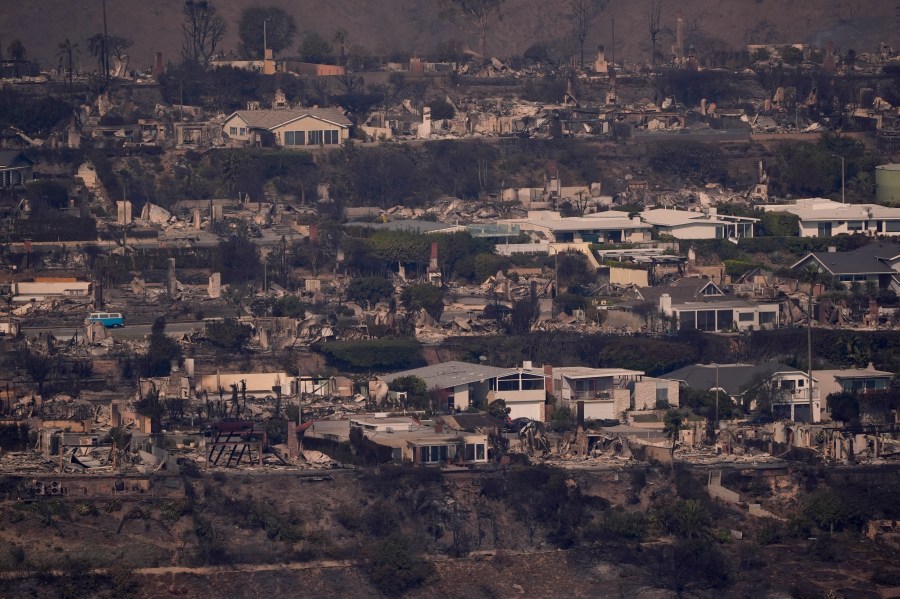 The devastation from the Palisades Fire is seen from the air in the Pacific Palisades neighborhood of Los Angeles, Thursday, Jan. 9, 2025. (AP Photo/Mark J. Terrill)