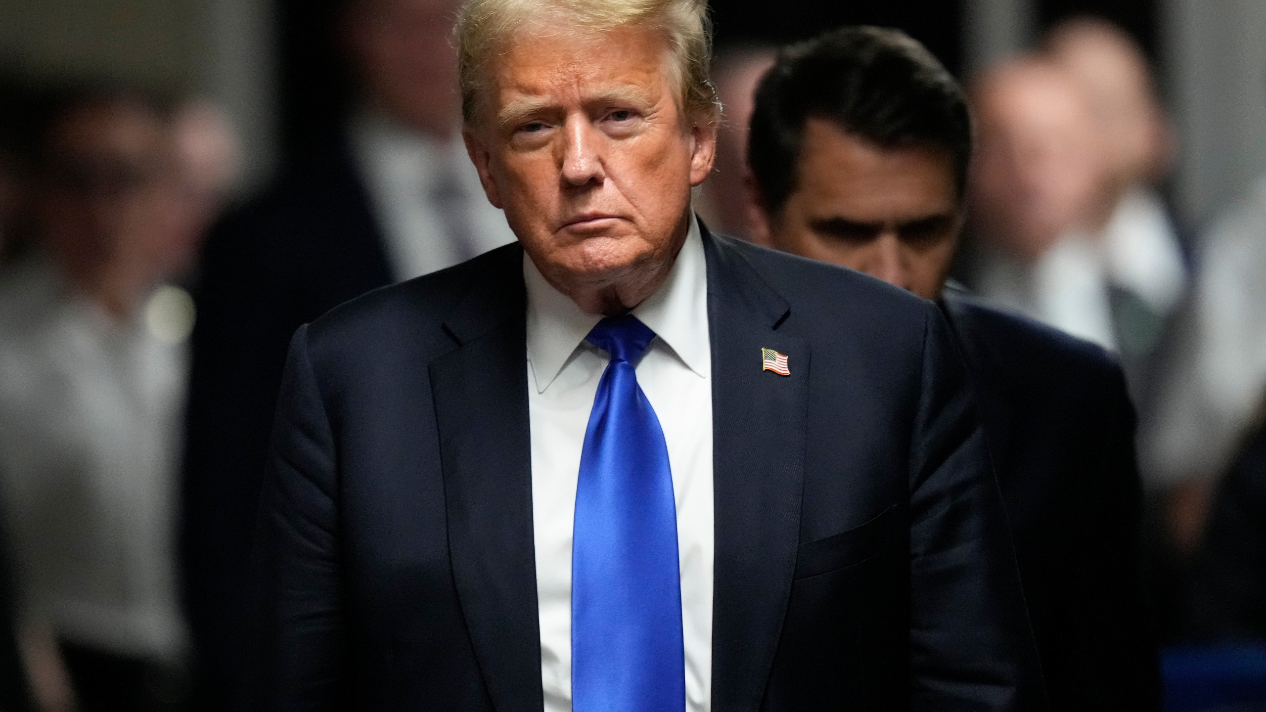 FILE - Former President Donald Trump walks to make comments to members of the media after a jury convicted him of felony crimes for falsifying business records in a scheme to illegally influence the 2016 election, at Manhattan Criminal Court, May 30, 2024, in New York. (AP Photo/Seth Wenig, Pool, File)