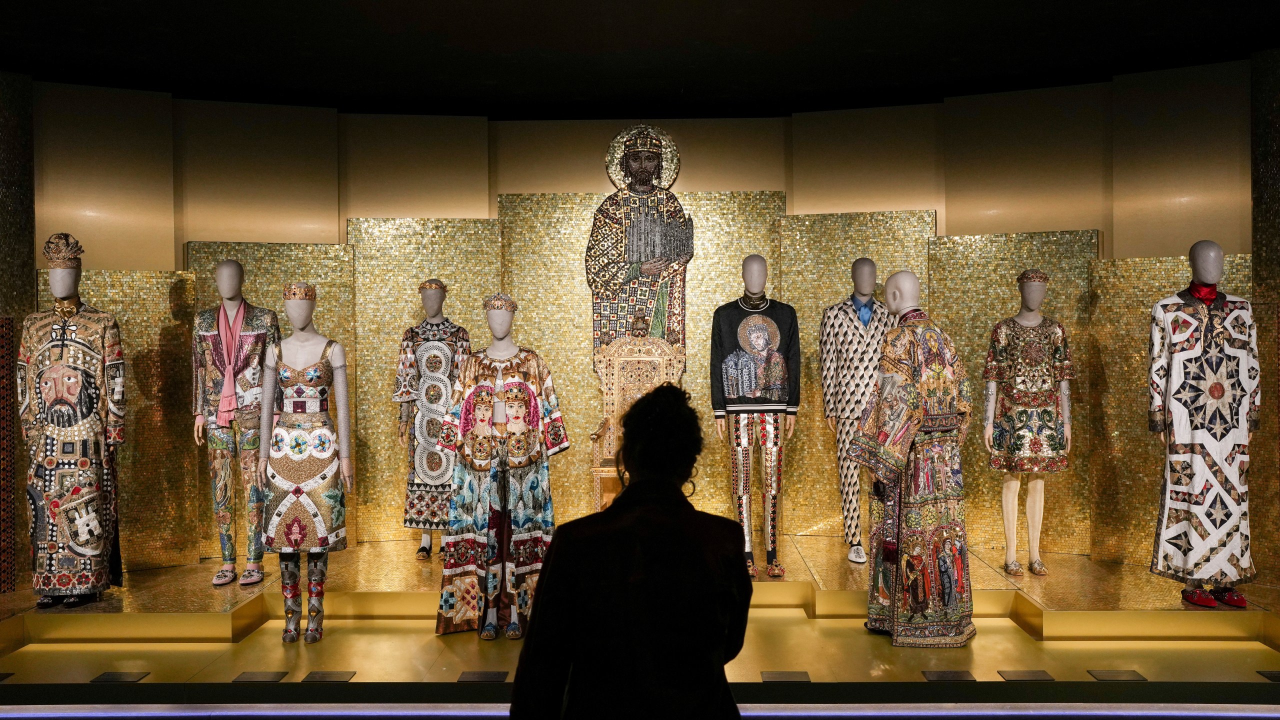 Creations are displayed during the exhibition "From the Heart to the Hands: Dolce&Gabbana" at the Grand Palais, in Paris, Thursday, Jan. 9, 2025. (AP Photo/Thibault Camus)