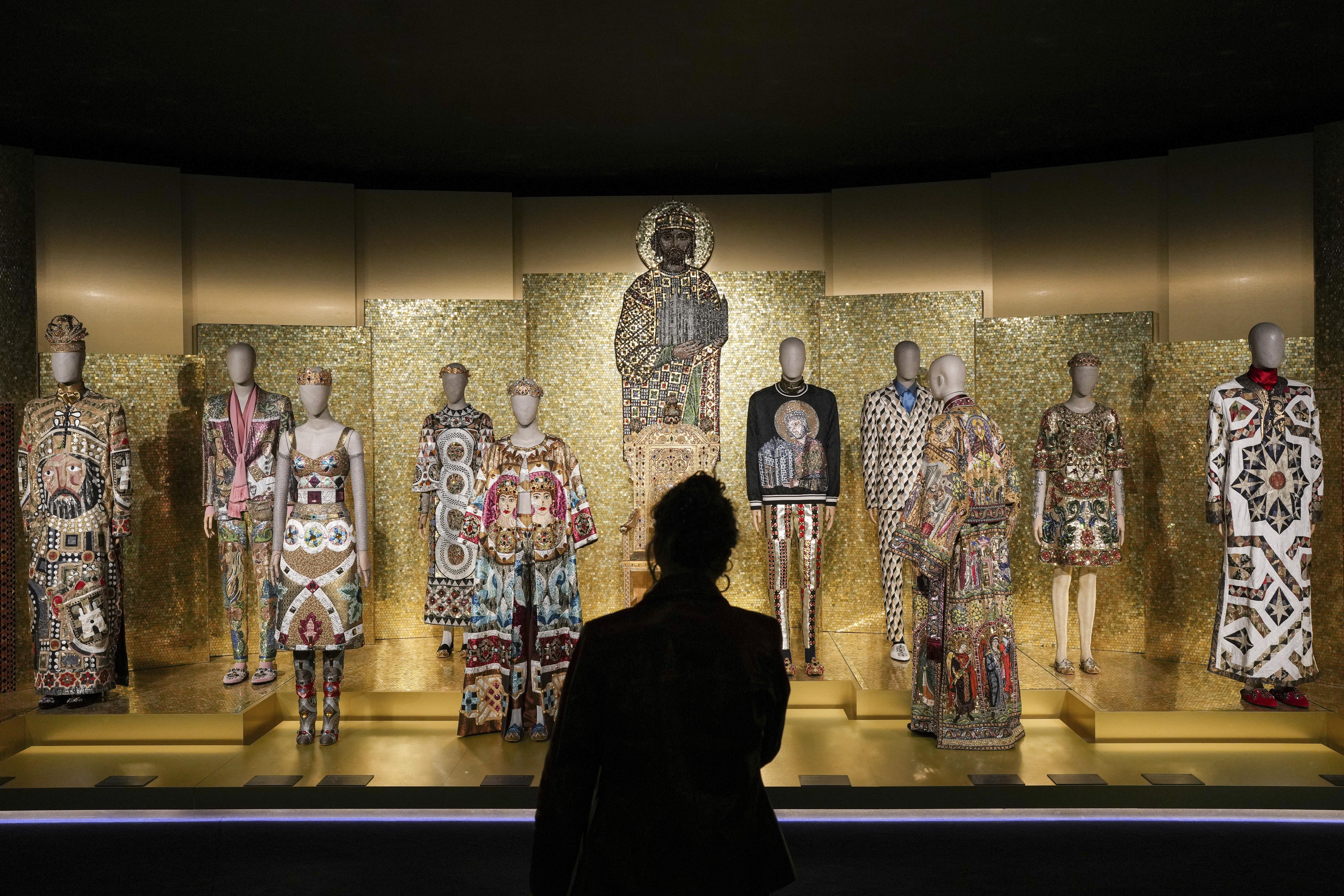 Creations are displayed during the exhibition "From the Heart to the Hands: Dolce&Gabbana" at the Grand Palais, in Paris, Thursday, Jan. 9, 2025. (AP Photo/Thibault Camus)