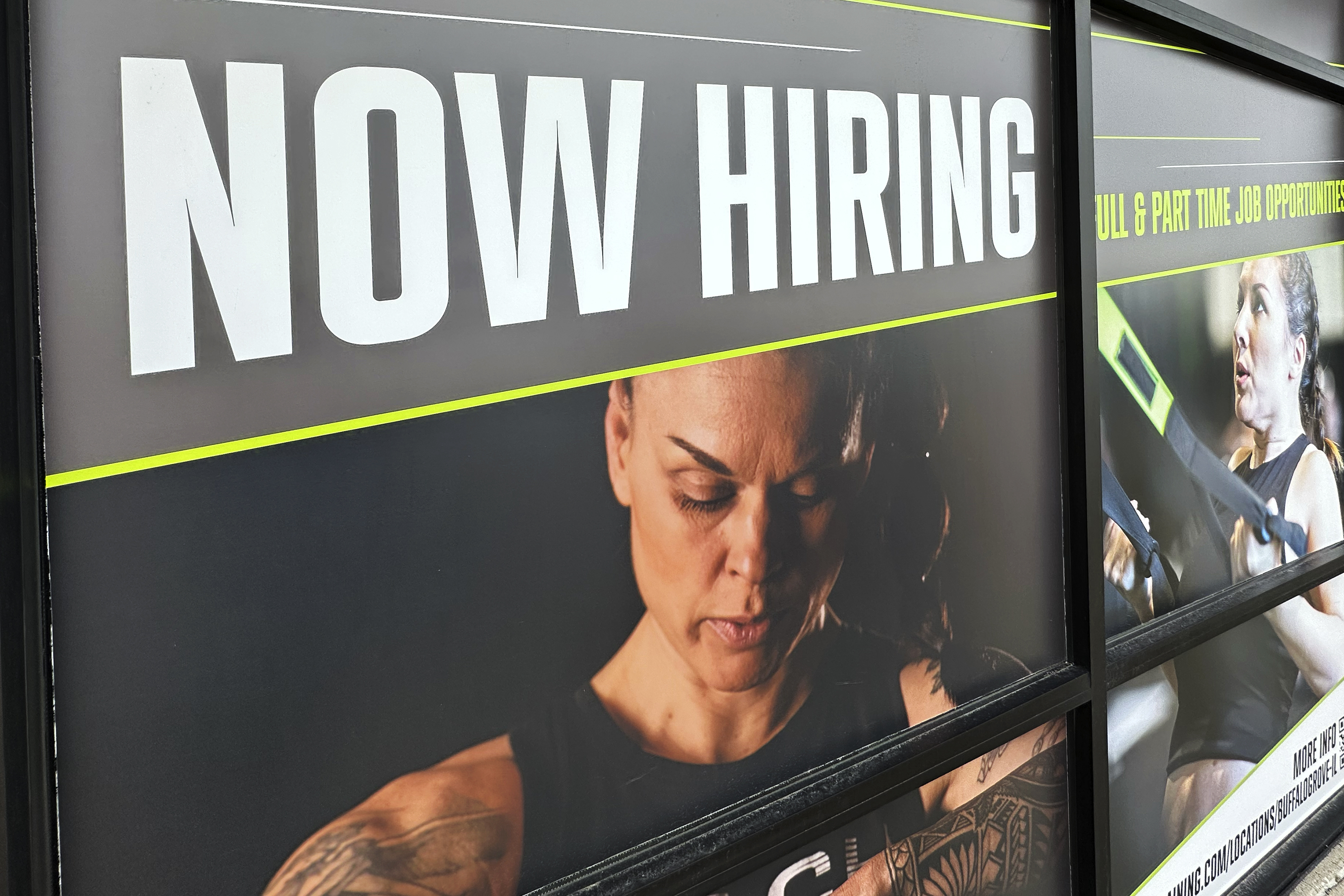 A hiring sign is displayed at a fitness center in Riverwoods, Ill., Sunday, Jan. 5, 2025. (AP Photo/Nam Y. Huh)