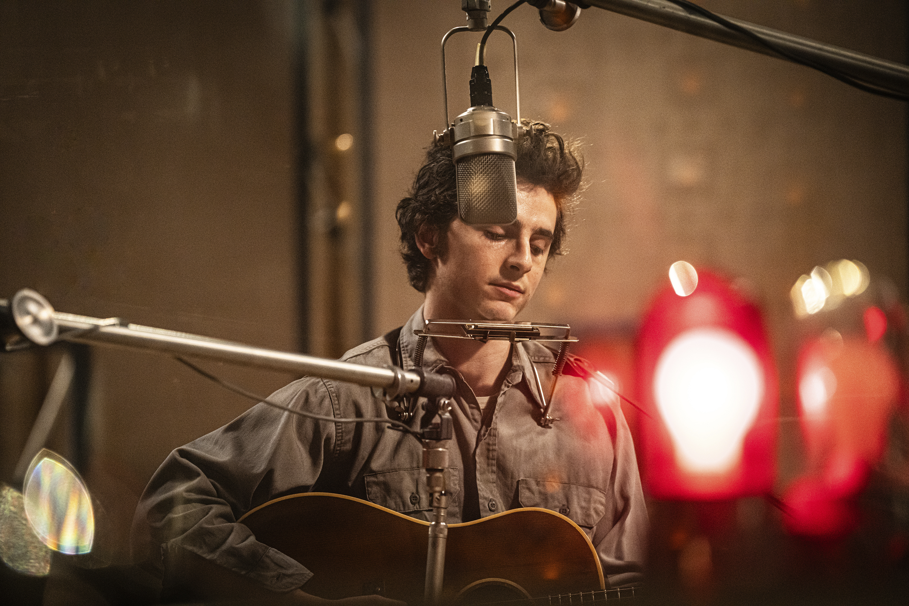 This image released by Searchlight Pictures shows Timothée Chalamet in a scene from "A Complete Unknown." (Macall Polay/Searchlight Pictures via AP)