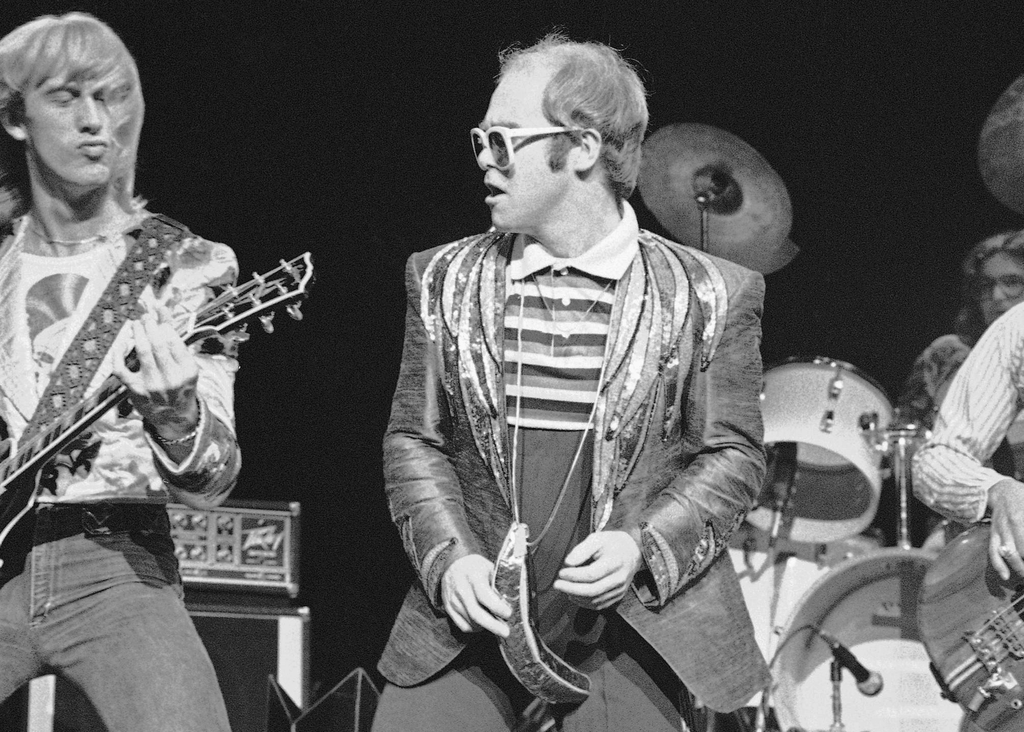 FILE - Rock star Elton John performs at Madison Square Garden, in New York on Aug. 10, 1976. (AP Photo, File)