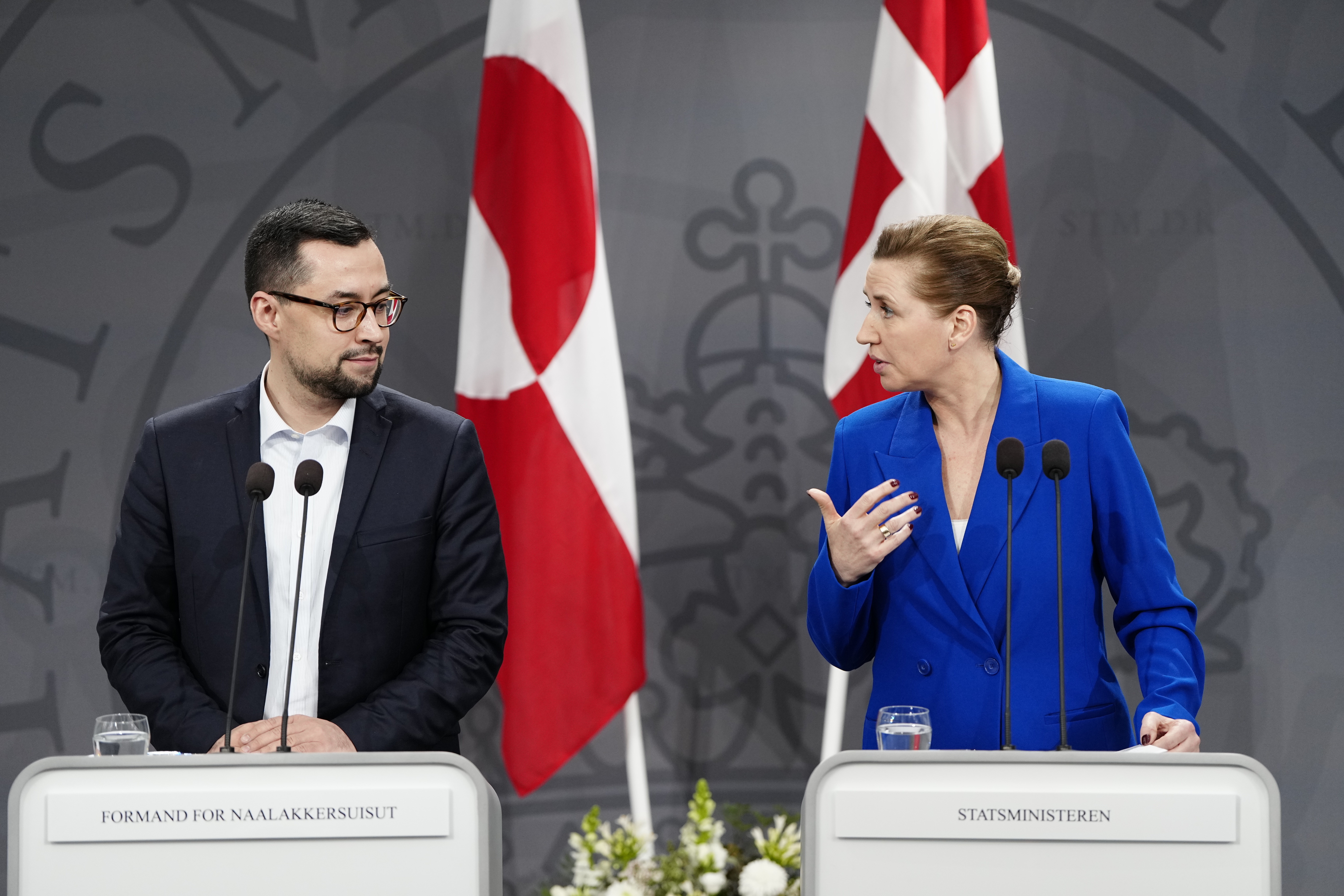 Danish Prime Minister Mette Frederiksen and her Greenland's counterpart Mute B. Egede, left, meet the media in the Mirror Hall at the Prime Minister's Office, at Christiansborg in Copenhagen, Friday, Jan. 10, 2025. (Mads Claus Rasmussen/Ritzau Scanpix via AP)