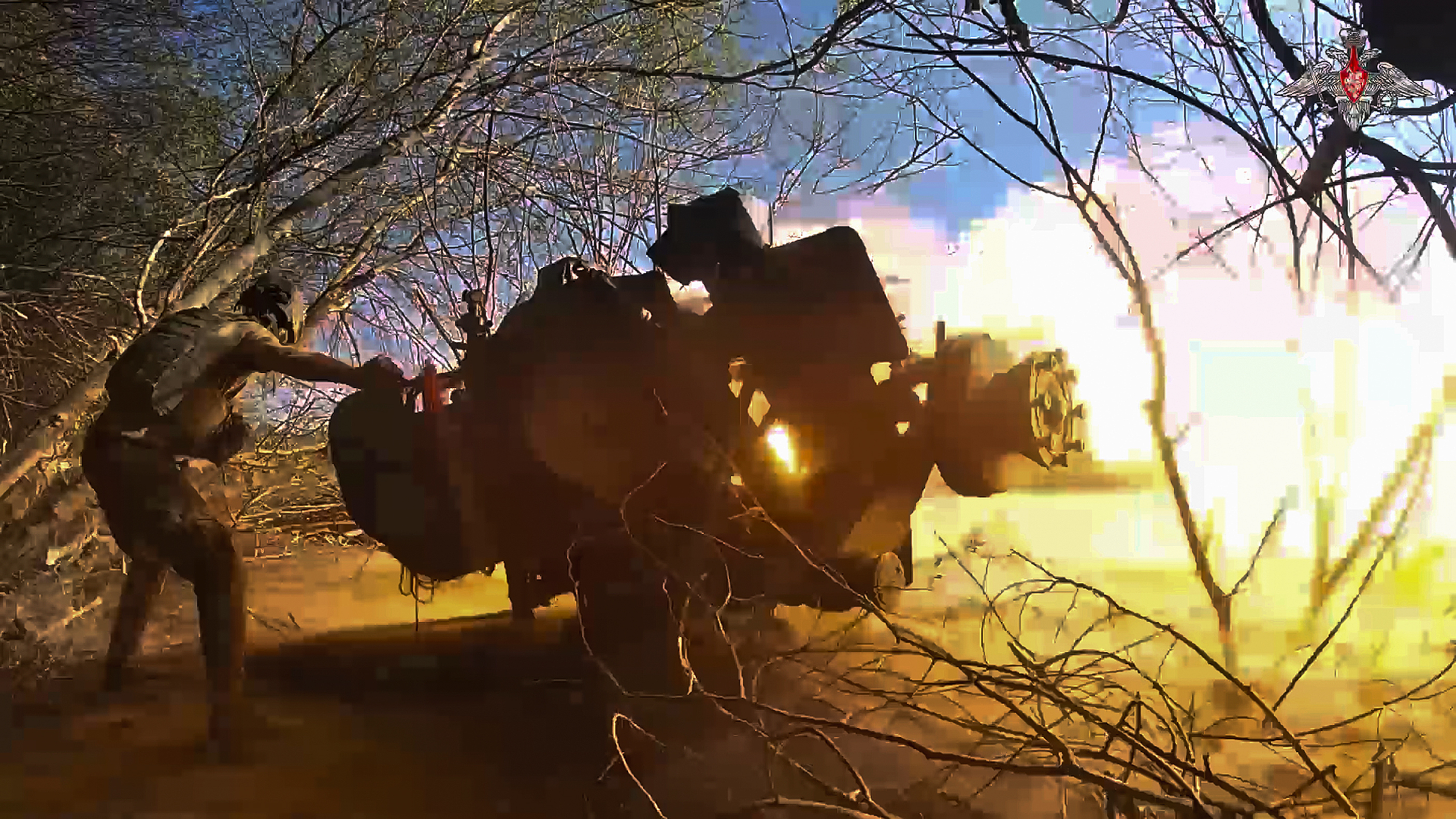 FILE - In this image from video released by the Russian Defense Ministry on Oct. 17, 2024, a Russian soldier fires a gun toward a Ukrainian position in the Russian-Ukrainian border area in the Kursk region, Russia. (Russian Defense Ministry Press Service photo via AP, File)