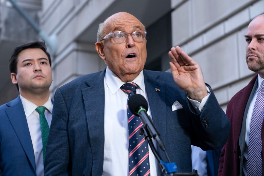 Rudy Giuliani speaks after leaving federal court in Washington, Friday, Jan. 10, 2025. (AP Photo/Jose Luis Magana)