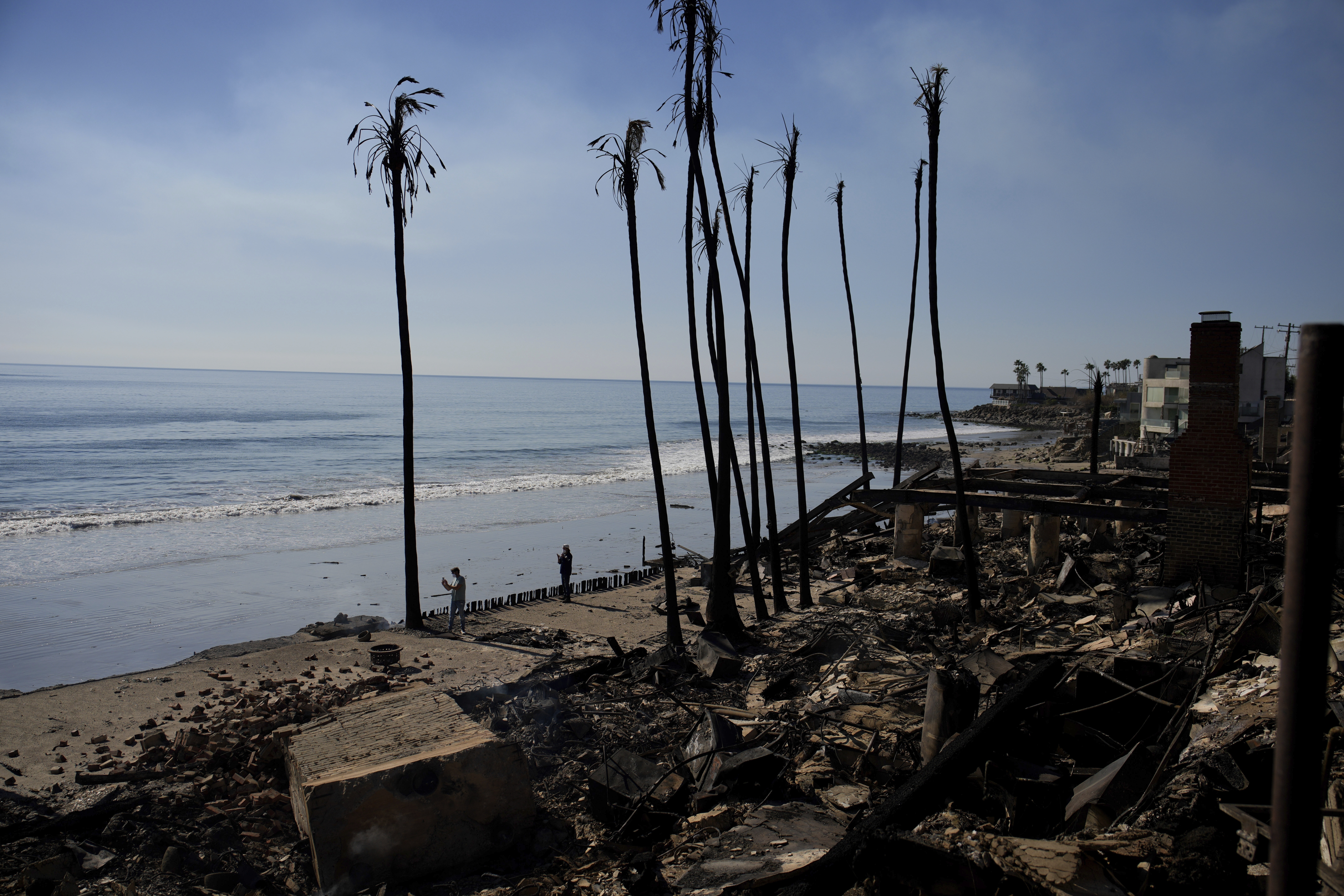 FILE - Beachfront properties are burned to the ground by the Palisades Fire on Friday, Jan. 10, 2025, in Malibu, Calif. (AP Photo/John Locher)