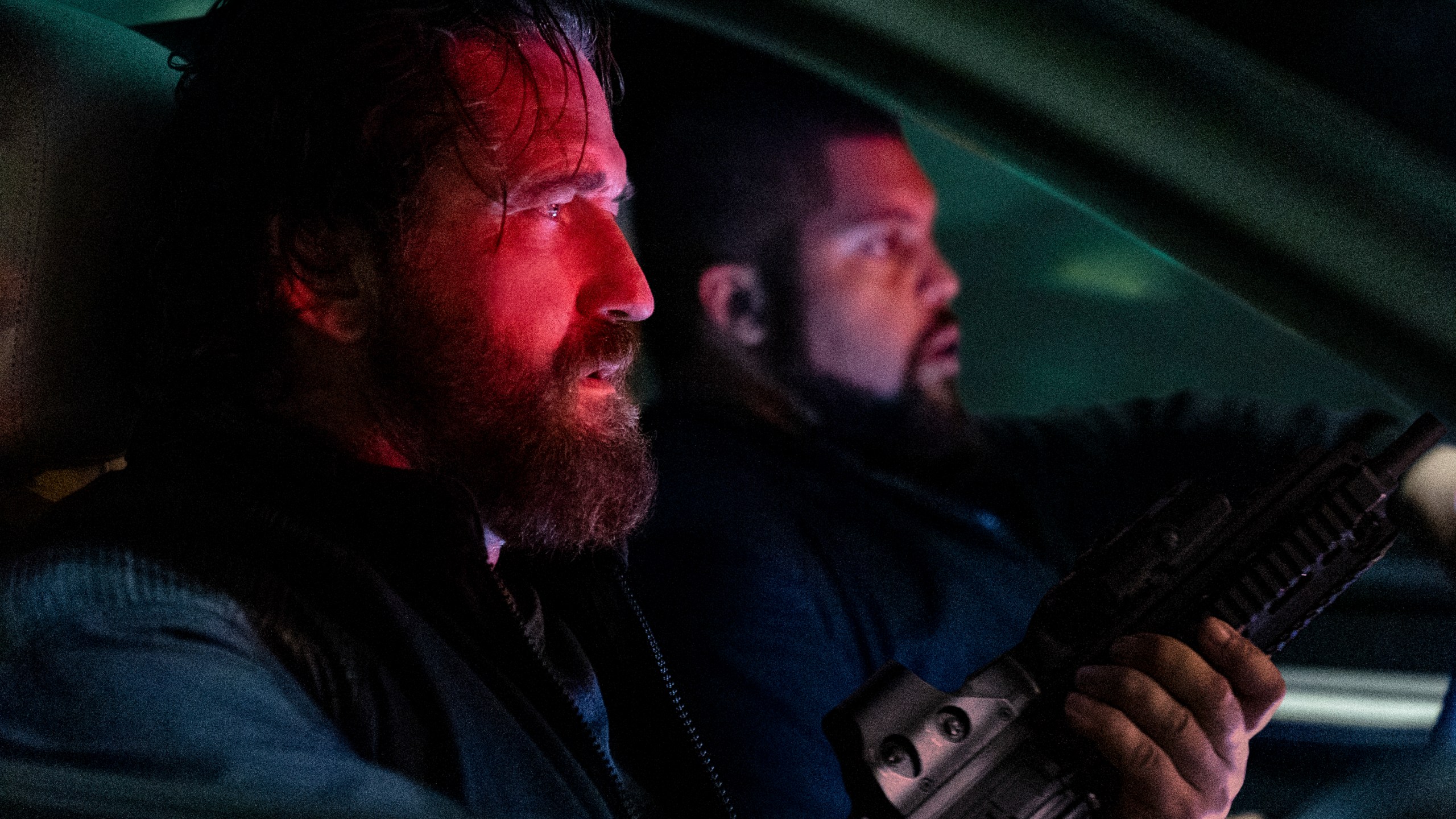 This image released by Lionsgate shows Gerard Butler, left, and O'Shea Jackson Jr. in a scene from "Den of Thieves 2: Pantera." (Rico Torres/Lionsgate via AP)