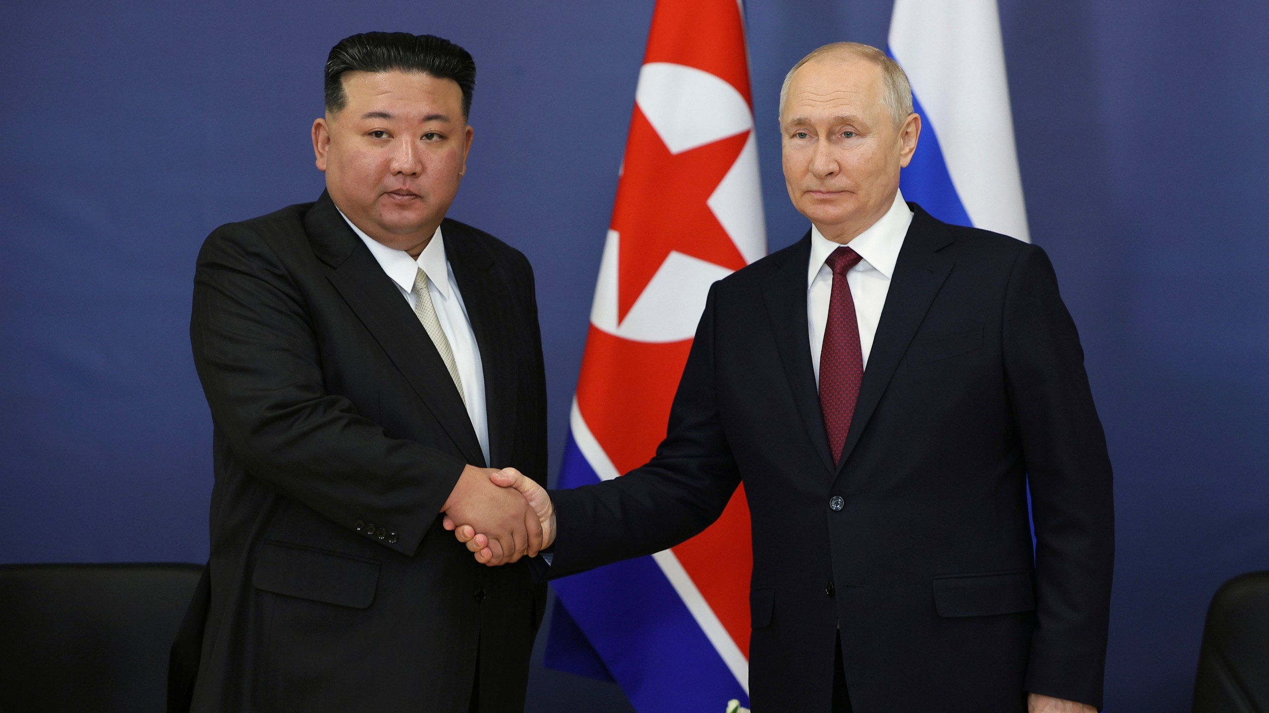 FILE - Russian President Vladimir Putin, right, and North Korean leader Kim Jong Un shake hands during their meeting at the Vostochny cosmodrome outside of Tsiolkovsky, in the far eastern Amur region, Russia on Sept. 13, 2023. (Vladimir Smirnov/Sputnik Kremlin Pool Photo via AP, File)